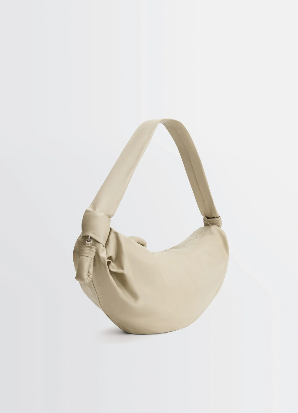 Lemaire Large Soft Croissant in Paper-effect leather, product shot, angled top view long strap visible