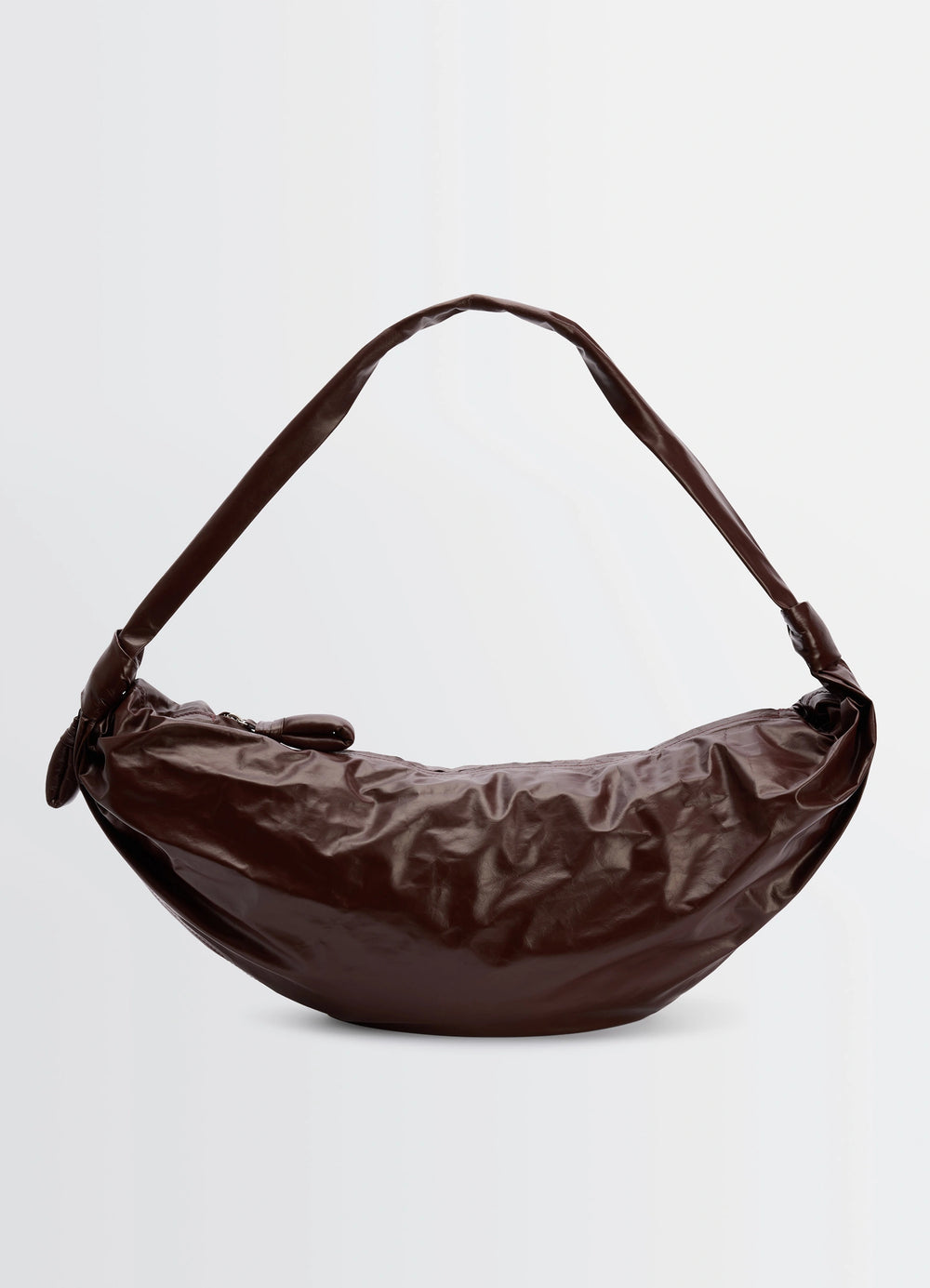 Lemaire Large Soft Croissant in Paper-effect leather, product shot, top view textured surface