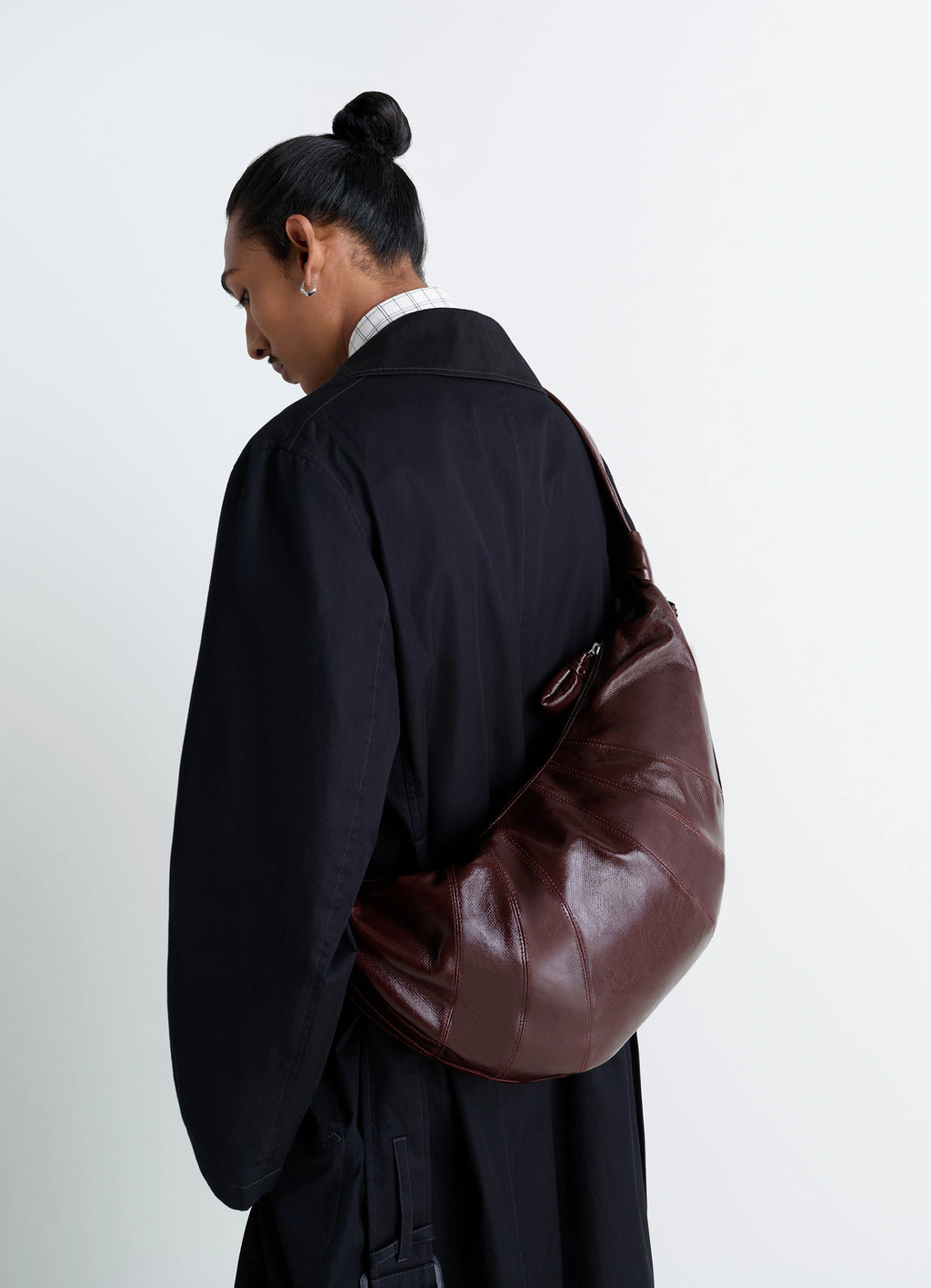 Lemaire Large Croissant Bag in coated cotton canvas, model shot, back view worn over shoulder