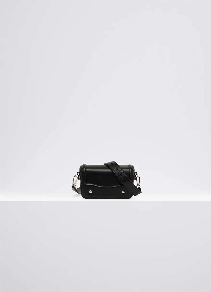 Lemaire Ransel Mini Satchel in Glossy Black Vegetable-Tanned Leath, product shot, Front view Rectangular body with flap