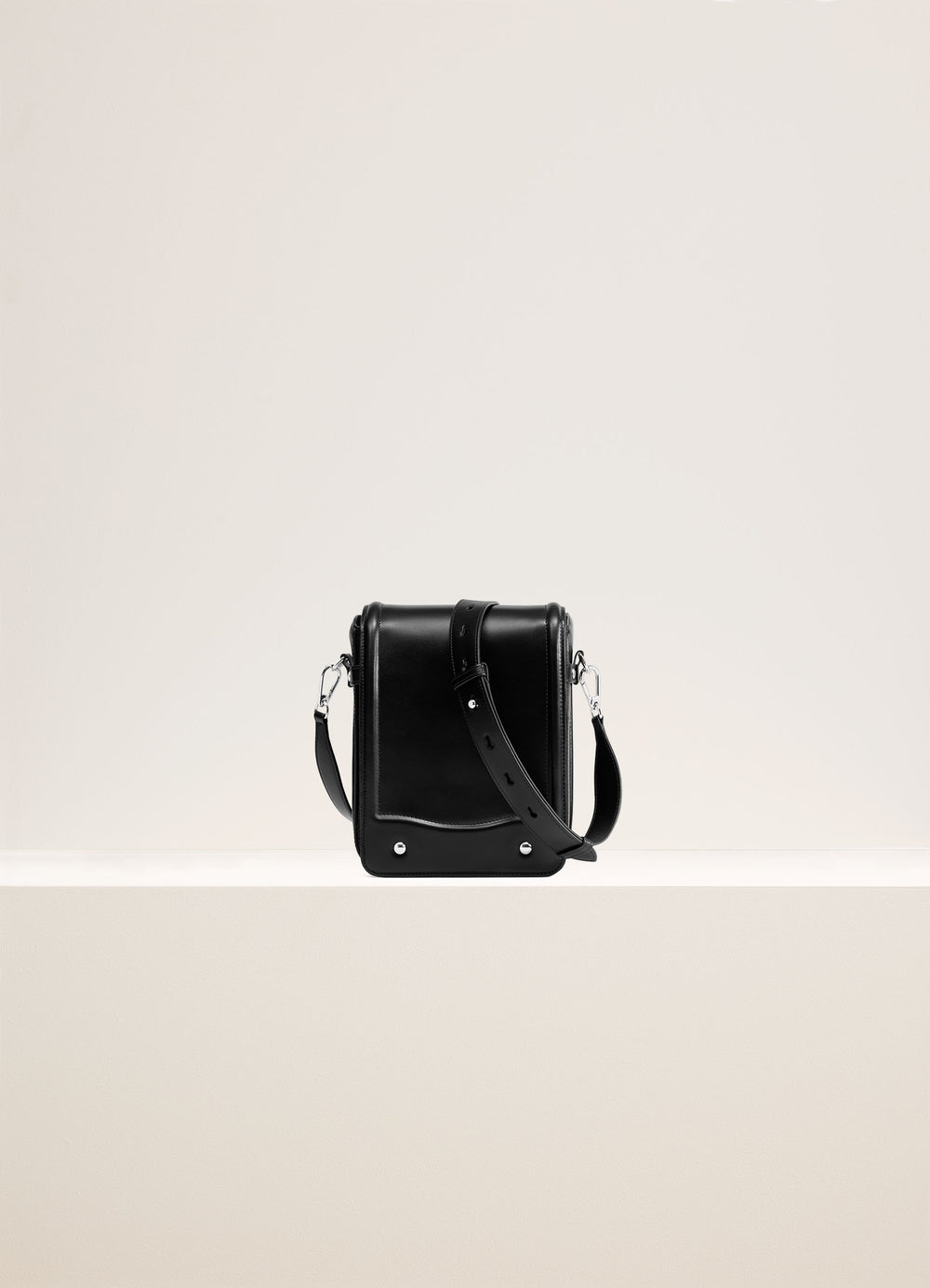 Lemaire Ransel Satchel Classic in Black vegetable-tanned leather, product shot, Front view Structured rectangular shape