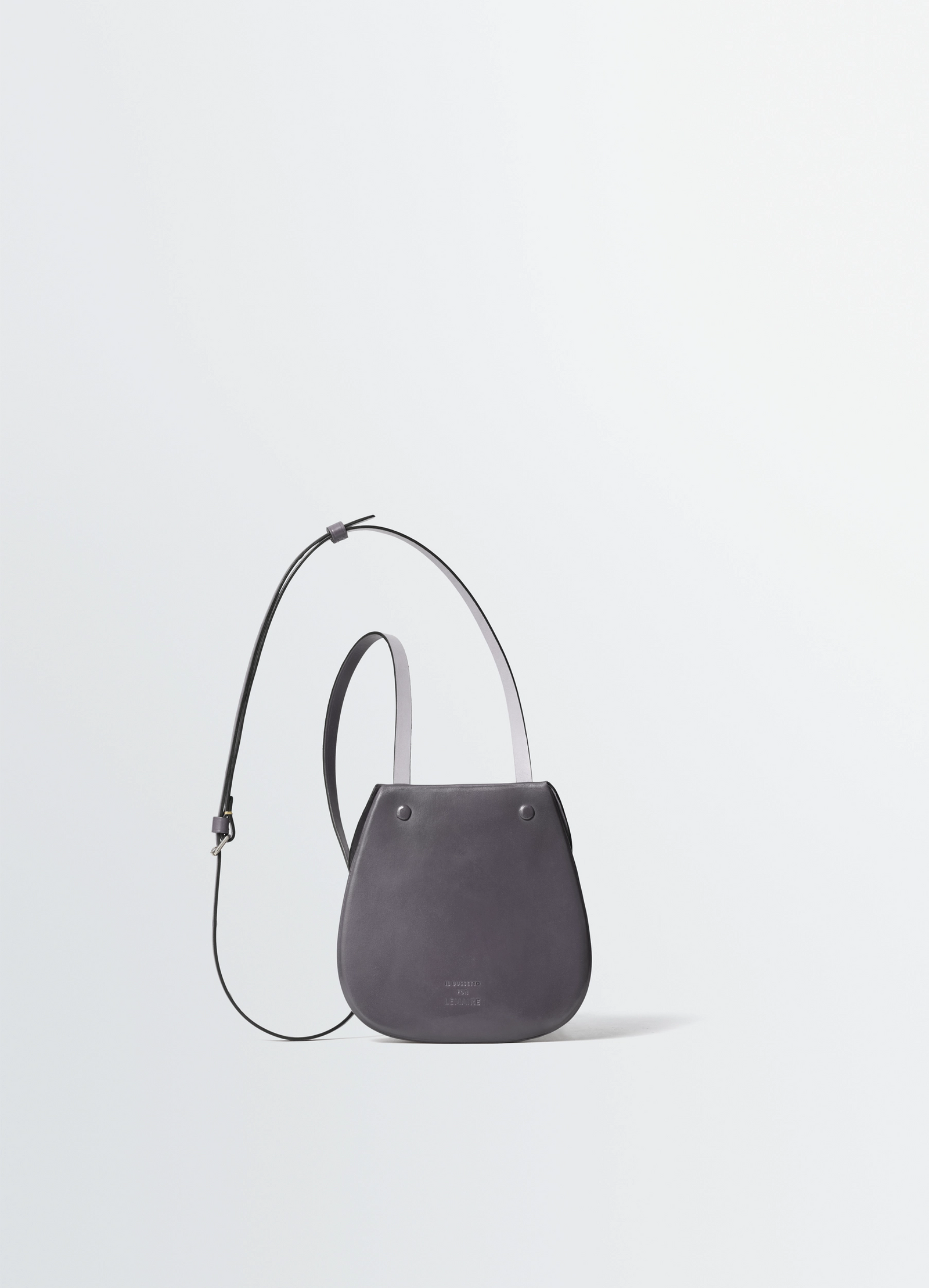 Il bussetto for lemaire small cartr in vegetable-tanned cowhide, product shot, side detail view adjustable strap design
