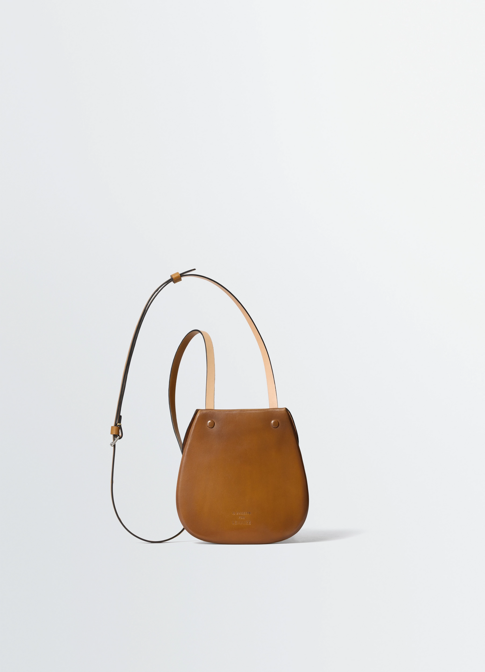 Il bussetto for lemaire small cartr in vegetable-tanned leather, product shot, back view minimalist design