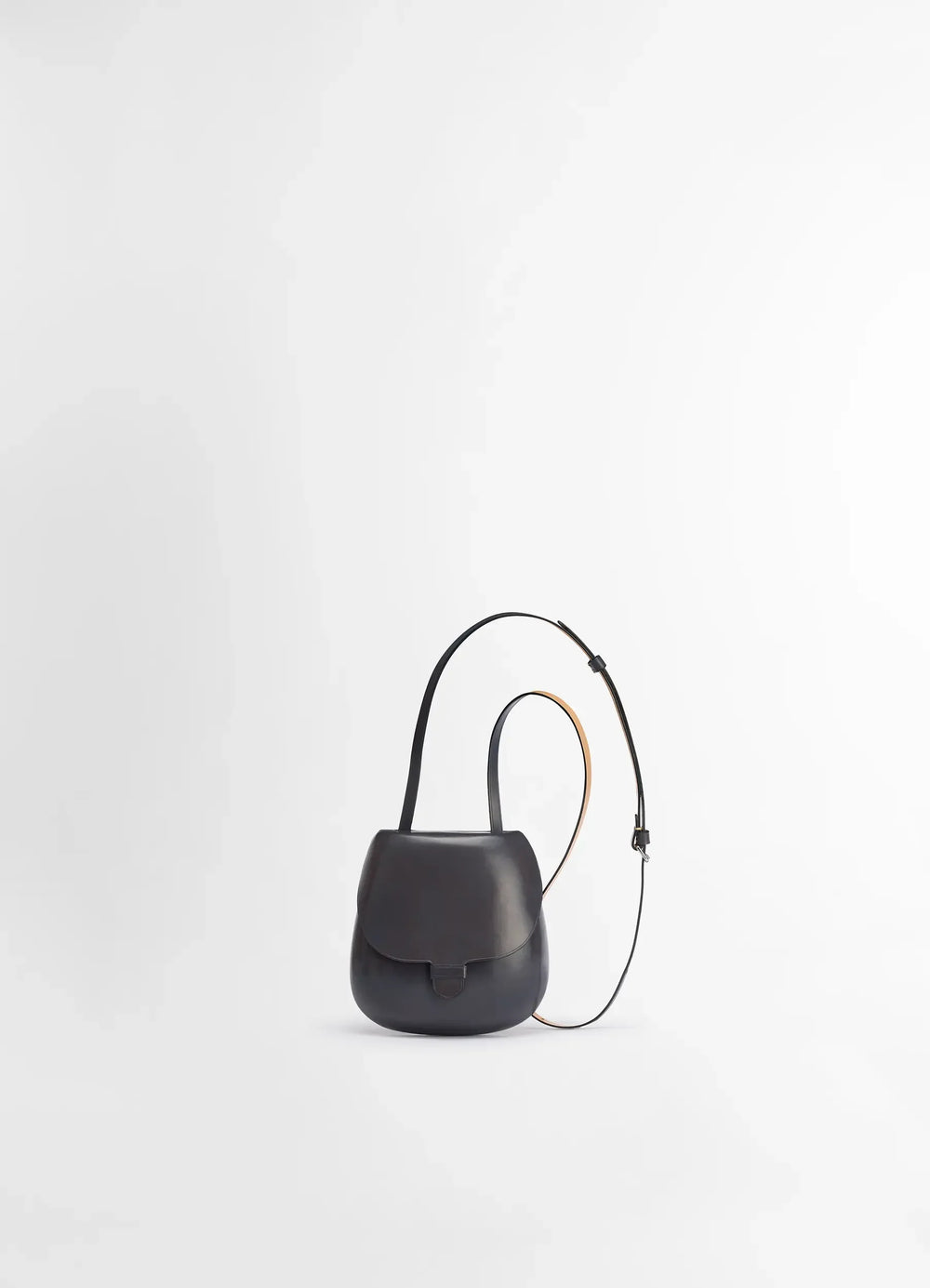 IL BUSSETTO FOR LEMAIRE SMALL CARTR in Vegetable-tanned Cowhide, product shot, front view sleek curved design