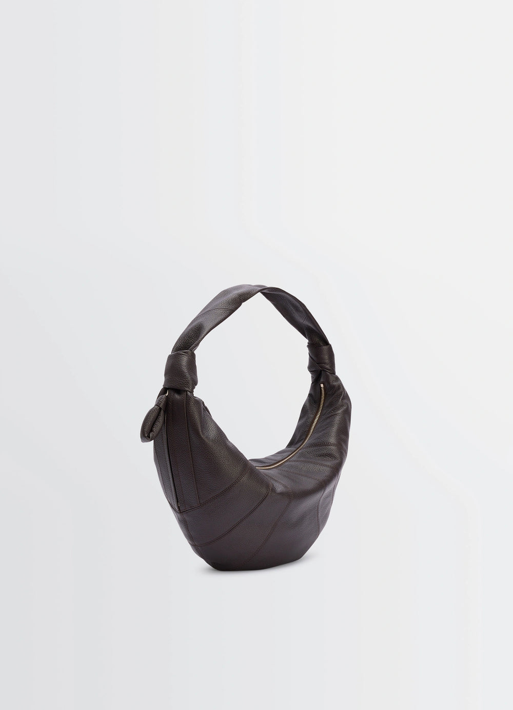 Fortune Croissant Bag in Grained Leather, product shot, three-quarter rear view curved seam detail