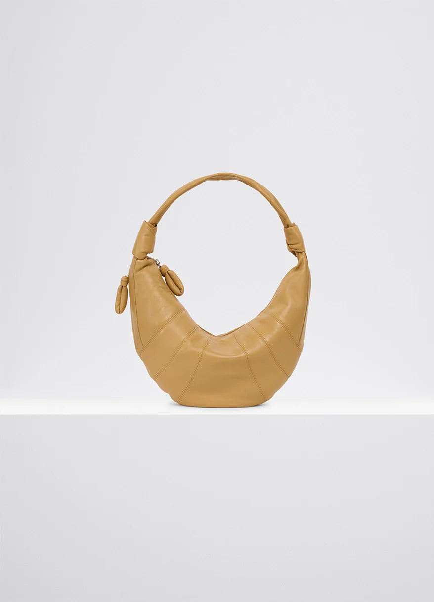 Lemaire Fortune Croissant Bag in Tan Nappa Lamb Leather, product shot, Front view Folded crescent design