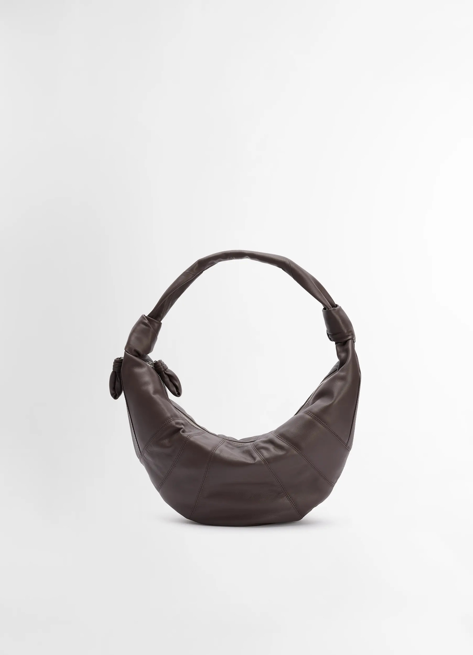 Lemaire fortune croissant bag in soft nappa lamb leather, product shot, front view smooth texture, knotted ends