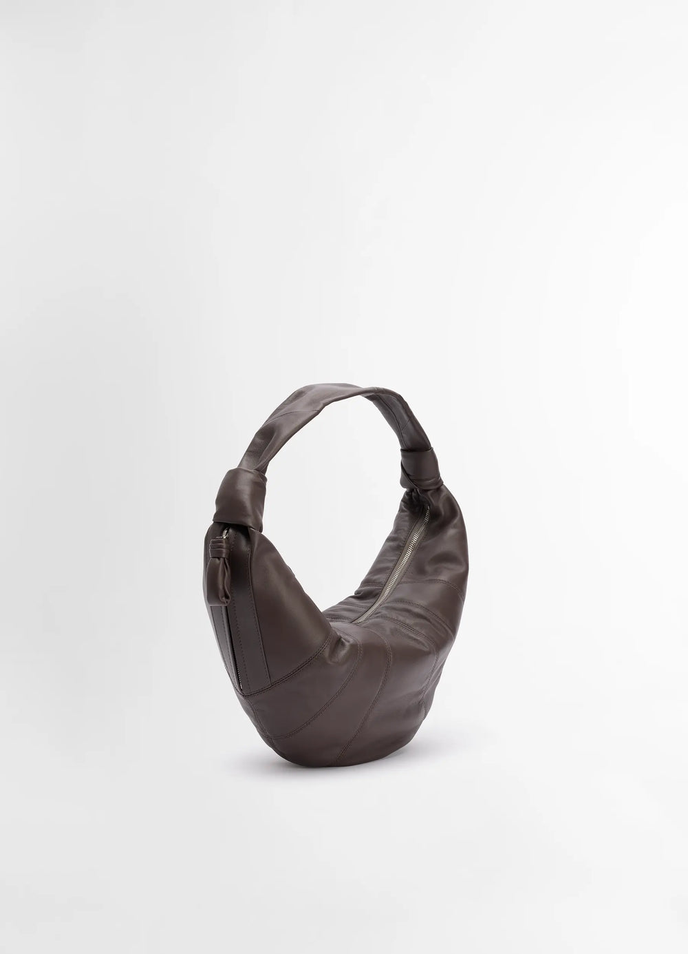 Lemaire Fortune Croissant Bag in Soft nappa lamb leather, product shot, three-quarter view zippered top, curved strap