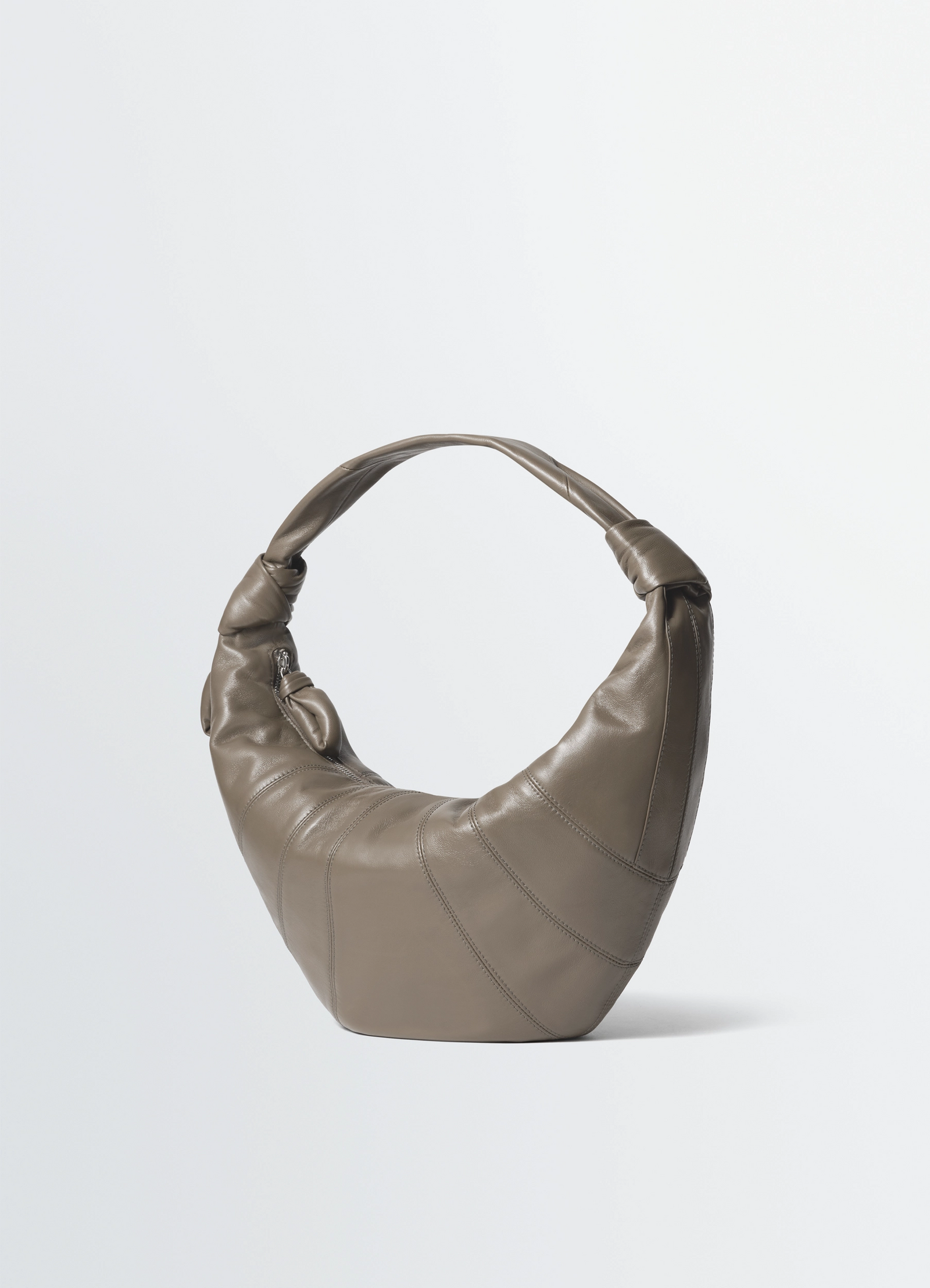 Fortune croissant bag in nappa lambskin leather, product shot, side view knotted handle detail