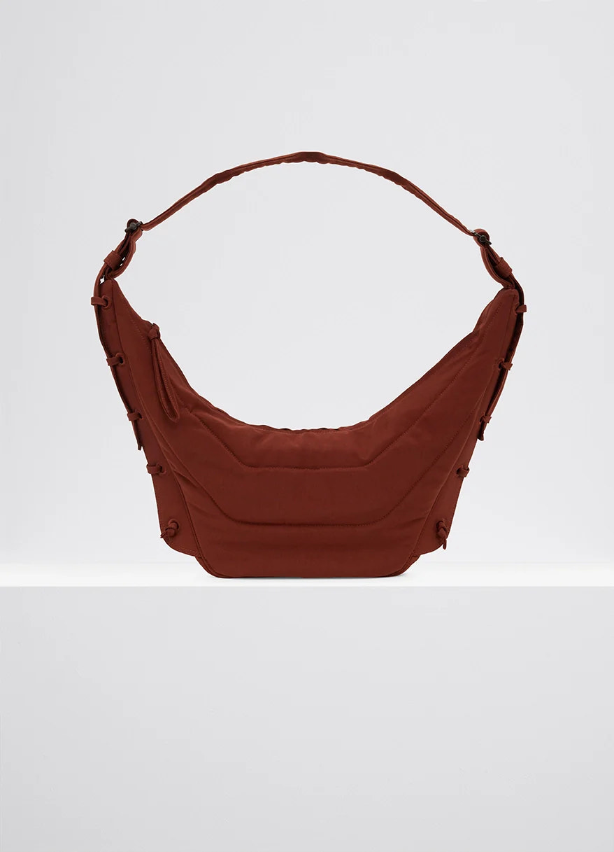 Medium soft game bag in fluffy-nylon canvas, product shot, front view embroidered eyelets