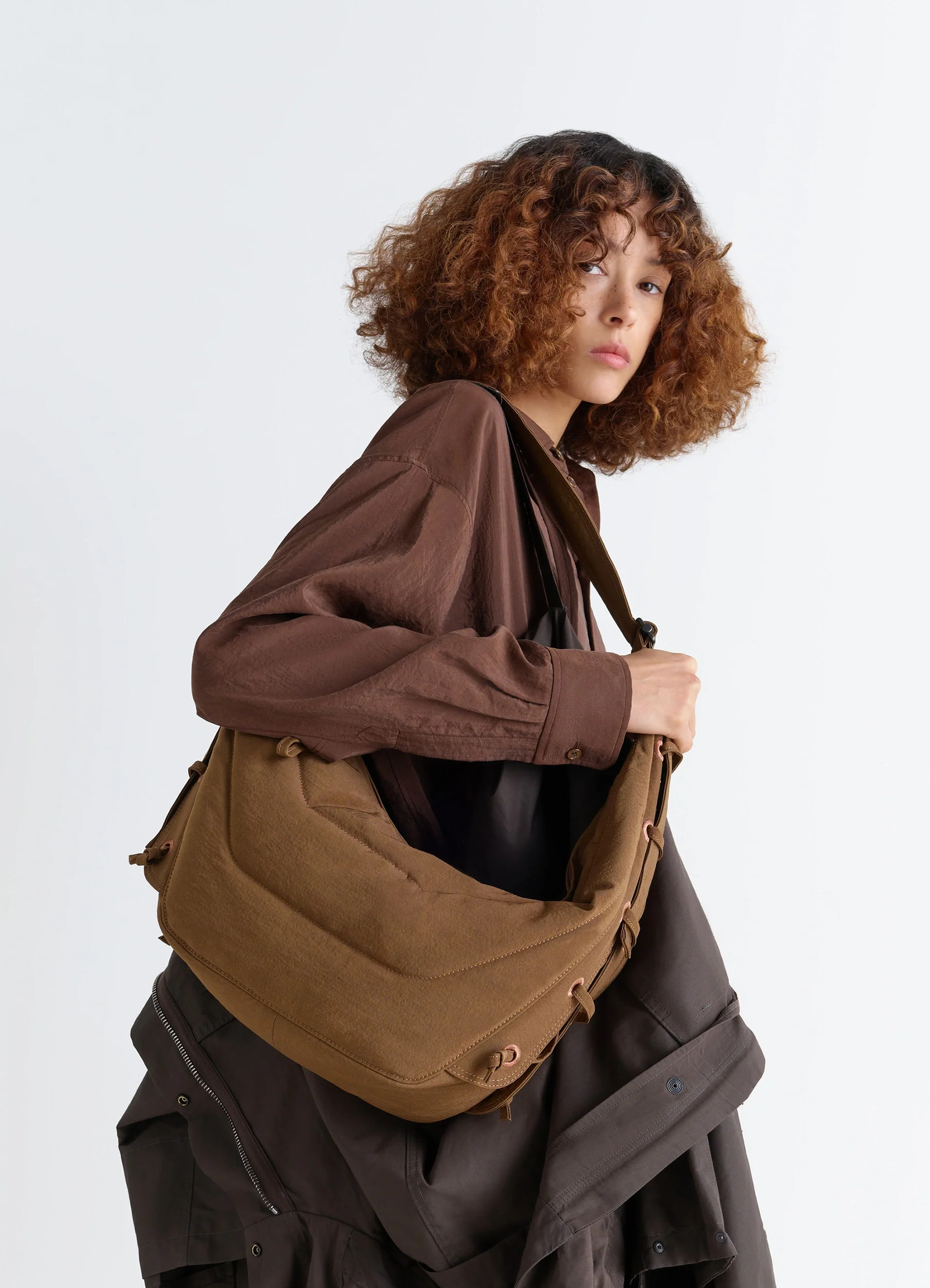 Soft game bag in quilted water-repellent nylon, model shot, side view medium-weight