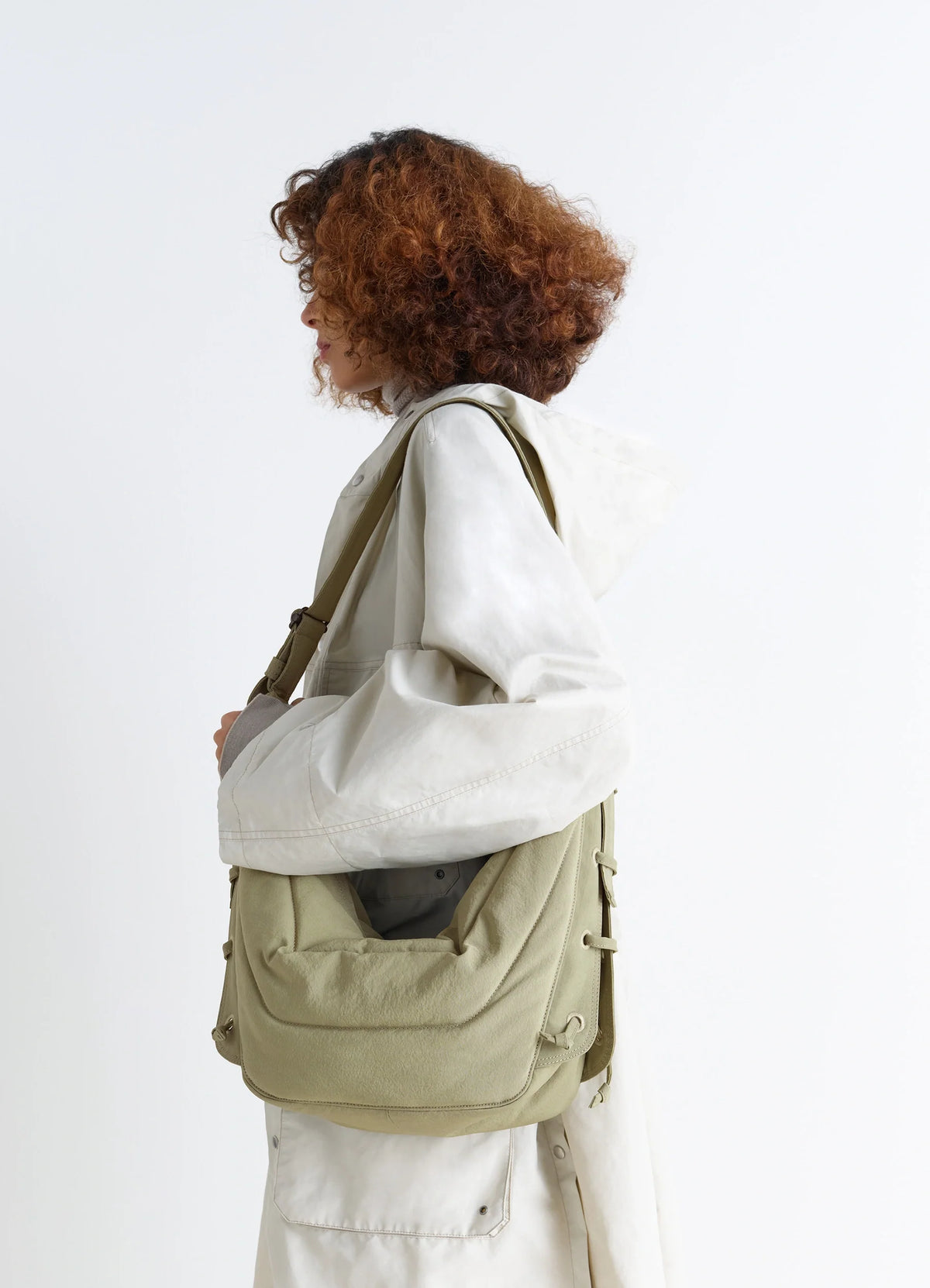 Medium Soft Game Bag in Quilted water-repellent nylon, model shot, Side view Worn crossbody