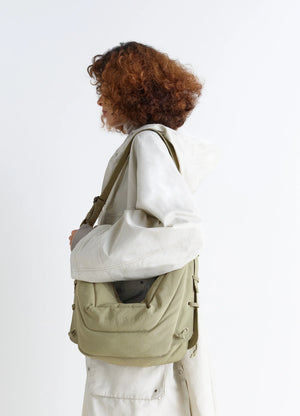 Medium Soft Game Bag in Quilted water-repellent nylon, model shot, Side view Worn crossbody