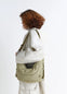 Medium Soft Game Bag in Quilted water-repellent nylon, model shot, Side view Worn crossbody