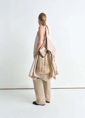 Lemaire Large Crossbody Filt Net Ba in Delicate nylon, dark chocolate leat, model shot, Back view Worn as cross-body