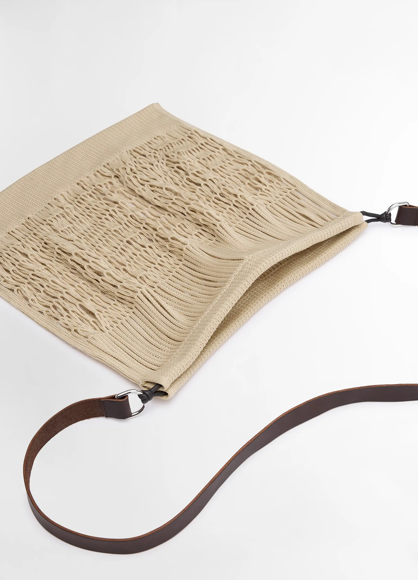 Lemaire large crossbody filt net ba in delicate nylon, dark chocolate leat, product shot, top view flat lay, intricate weave