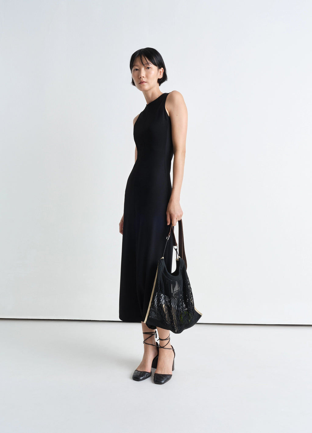 Large Crossbody Filt Net Bag in Dark Chocolate Leather Nylon, model shot, Front view Worn by model