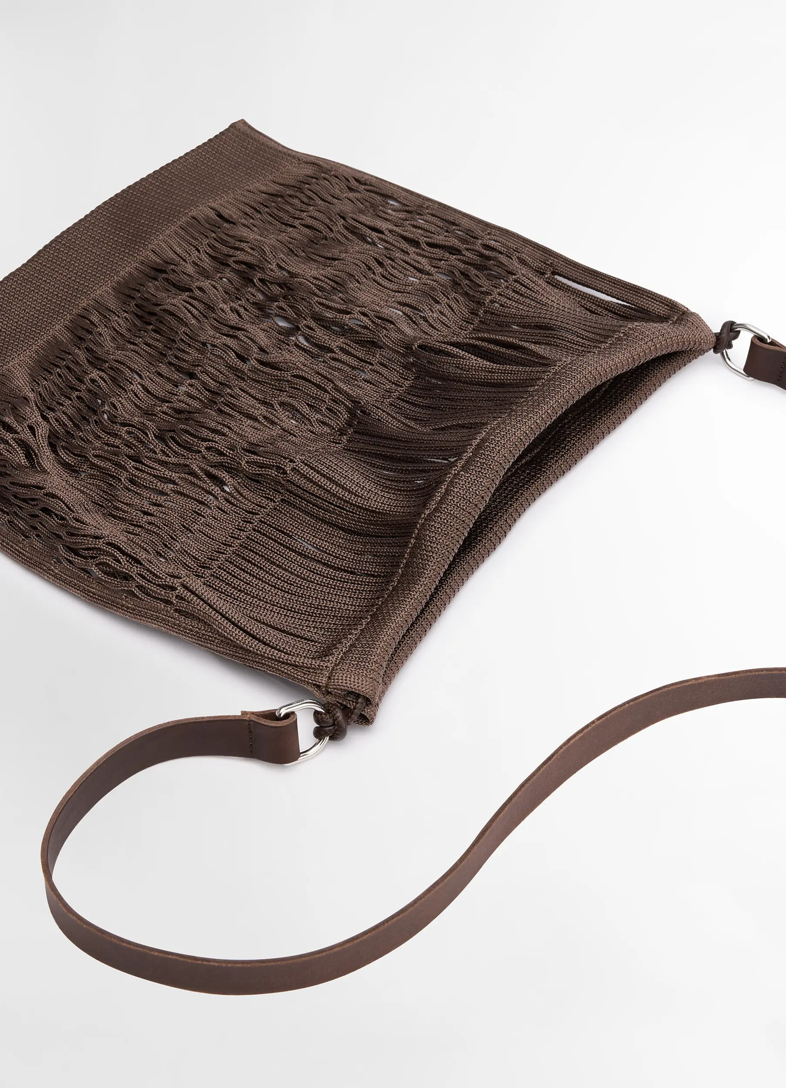 Lemaire large crossbody filt net ba in dark chocolate, nylon, leather, product shot, top angled view weave texture, strap det