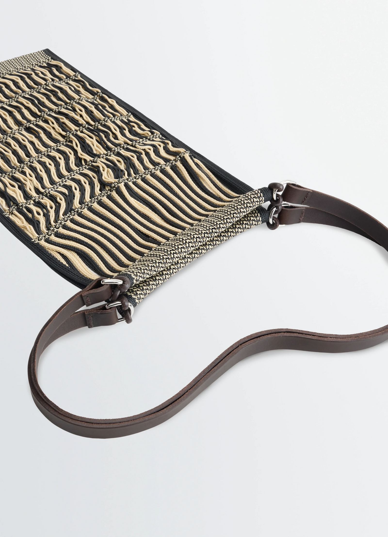 Lemaire filt net shopping bag in nylon mesh with leather, product shot, top angled view detailed strap close-up