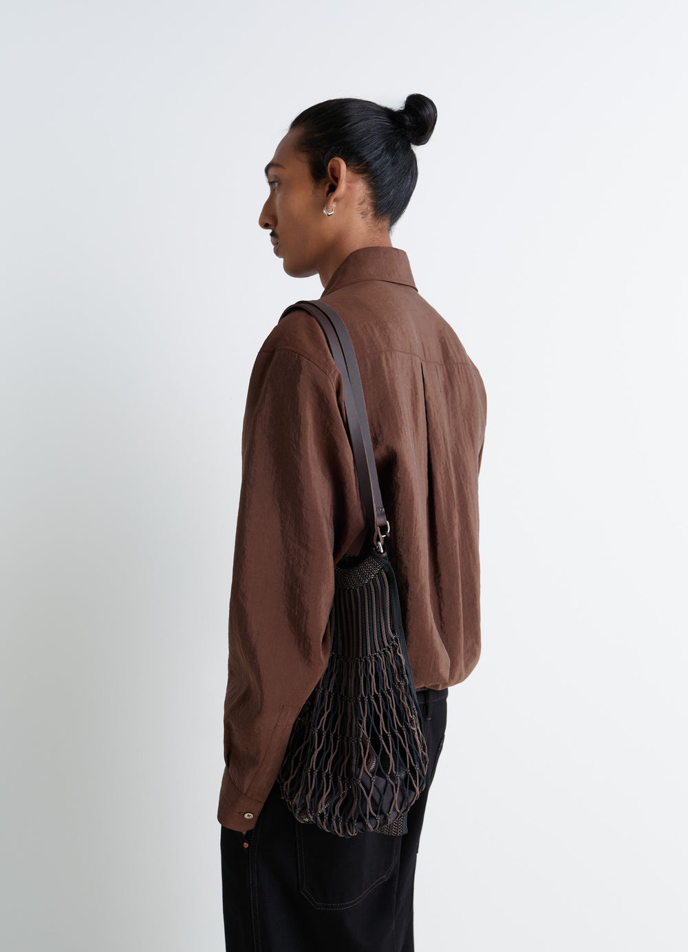 Lemaire Filt Net Shopping Bag in Nylon mesh, leather, model shot, Side view Shoulder strap detail