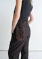 Lemaire Mini Crossbody Filt Net Bag in Dark Chocolate Nylon and Leather, model shot, Side view Worn cross-body on model