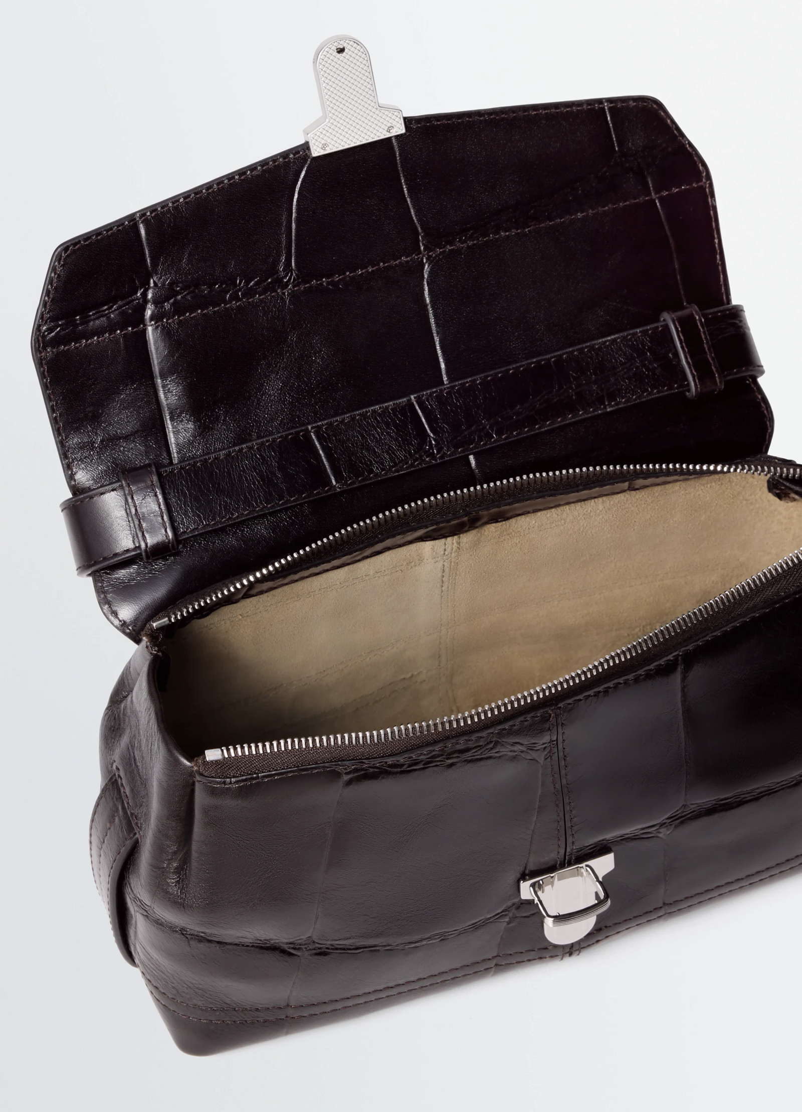 Small soft gear bag in black croco-embossed leather, product shot, top-down interior view open zipper and flap detail