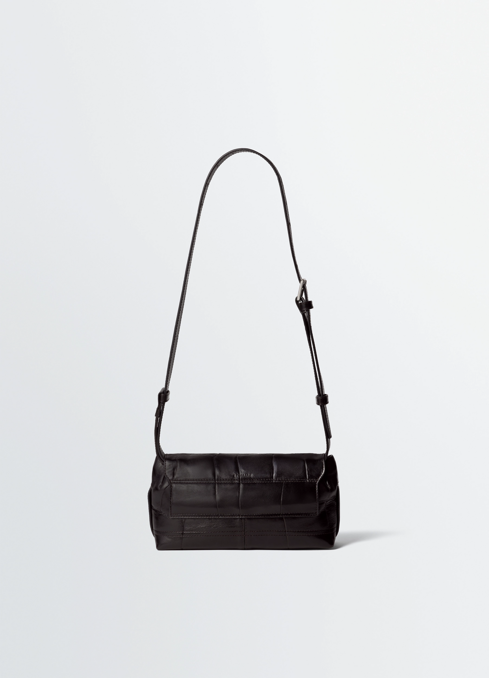 Small soft gear bag in black croco-embossed leather, product shot, back view long shoulder strap