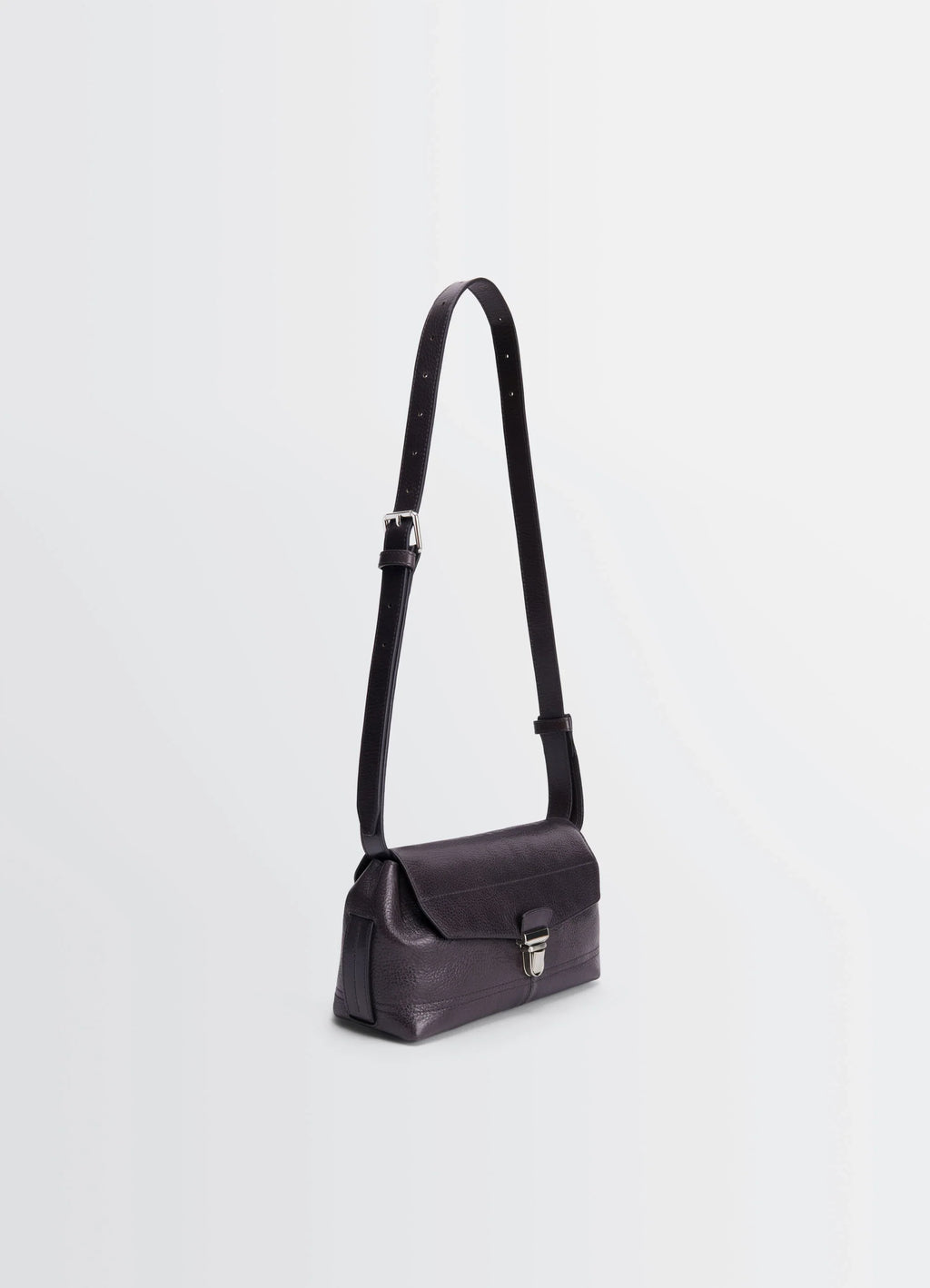 Lemaire Small Gear Bag in Glossy Vegetable-Tanned Leather, product shot, angled top view metallic buckle detail