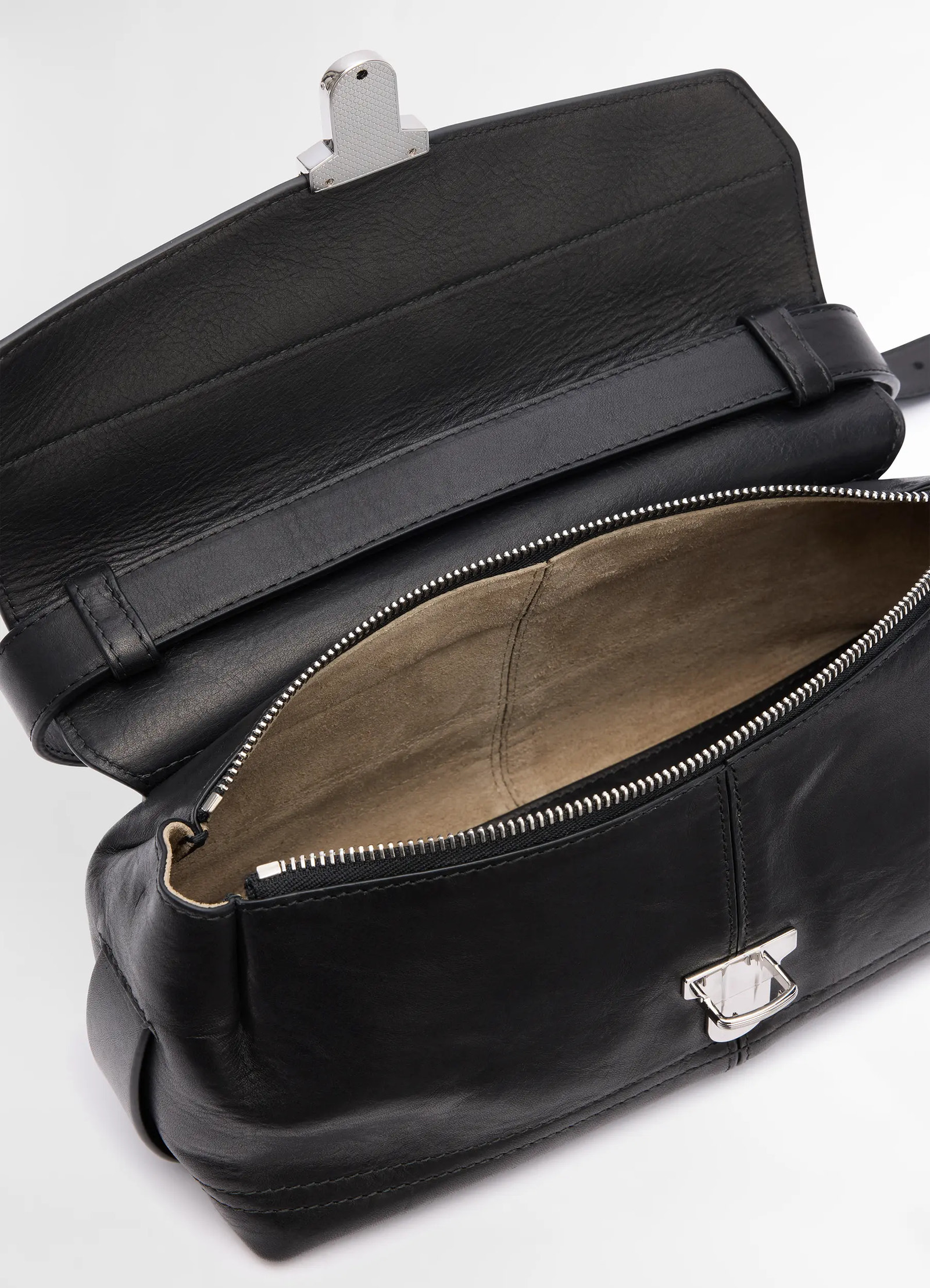 Lemaire small gear bag in black vegetable-tanned nappa leathe, product shot, top interior view zippered compartment detail