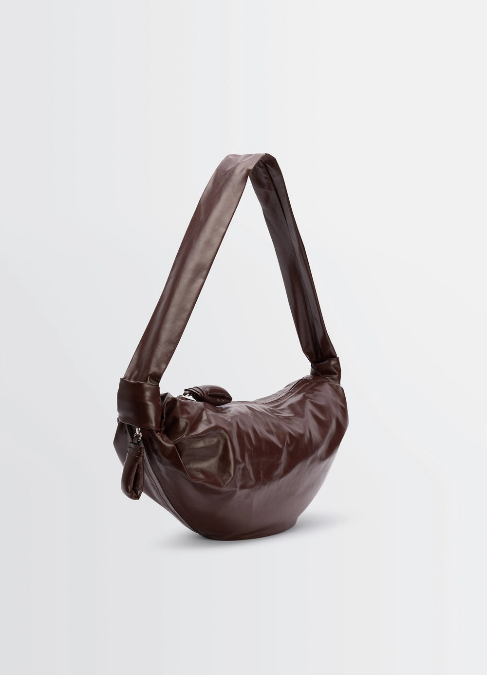 Lemaire Medium Soft Croissant in paper-effect leather, product shot, three-quarter view crinkled finish, angled view