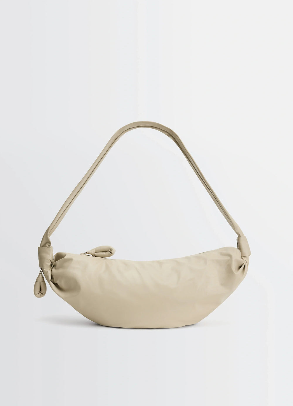 Lemaire Medium Soft Croissant in Paper-effect leather, product shot, side profile view elongated shoulder strap