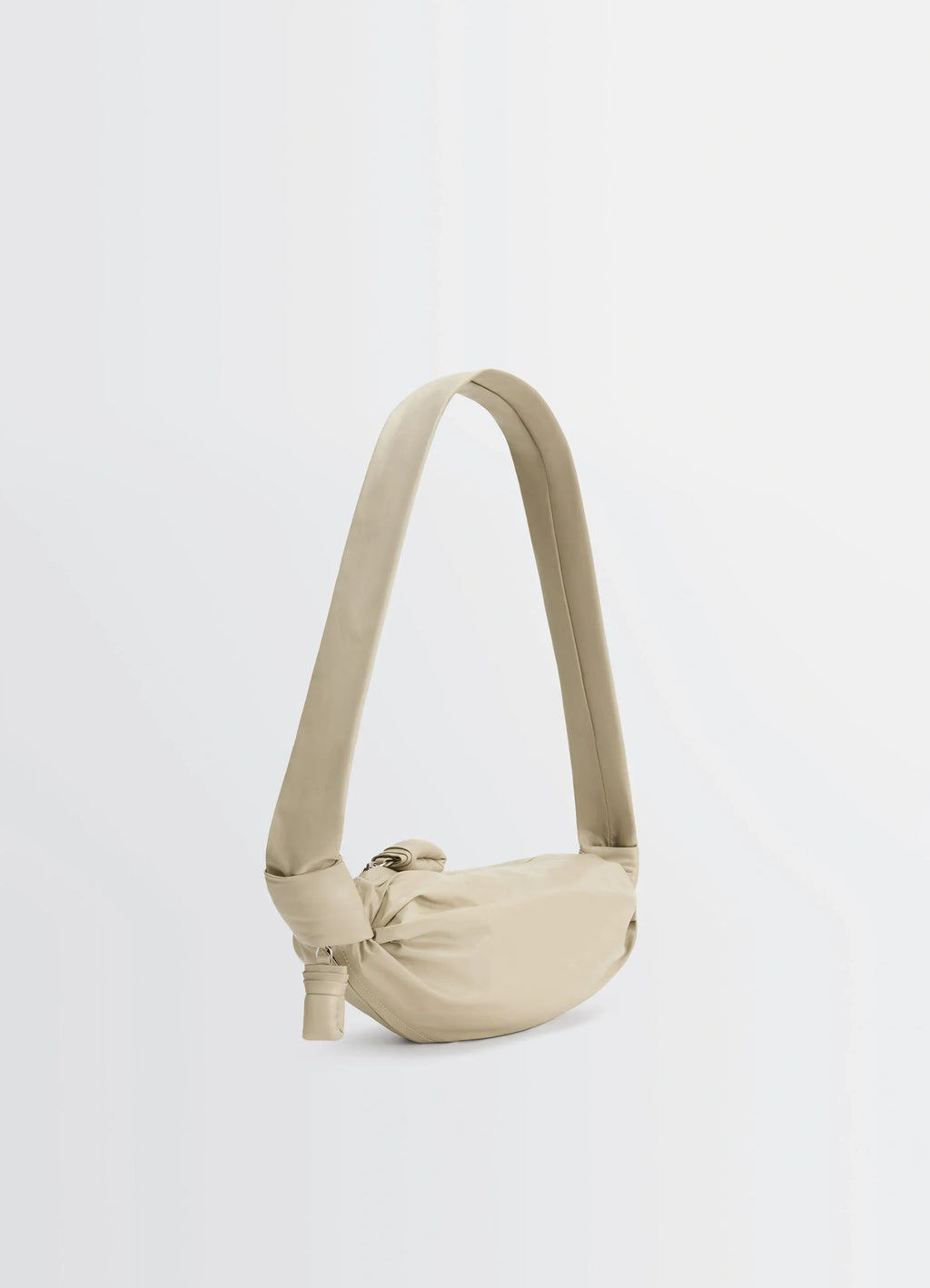 Lemaire Small Soft Croissant in Beige Paper-Effect Leather, product shot, three-quarter front view curved structured strap