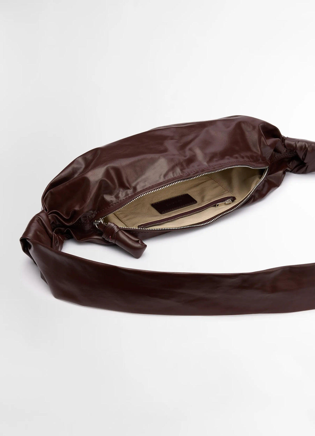 SMALL SOFT CROISSANT BAG IN PAPER LEATHER - Roasted Pecan - Paper