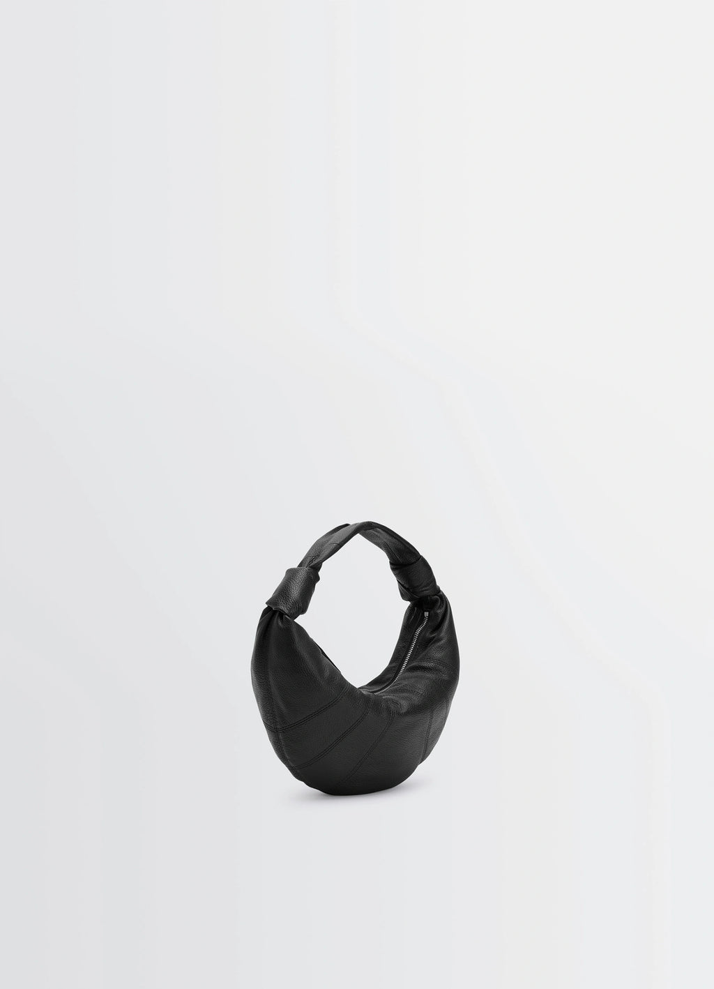 Mini Fortune Croissant Bag in Black Grained Leather, product shot, angled top view soft, slouchy texture