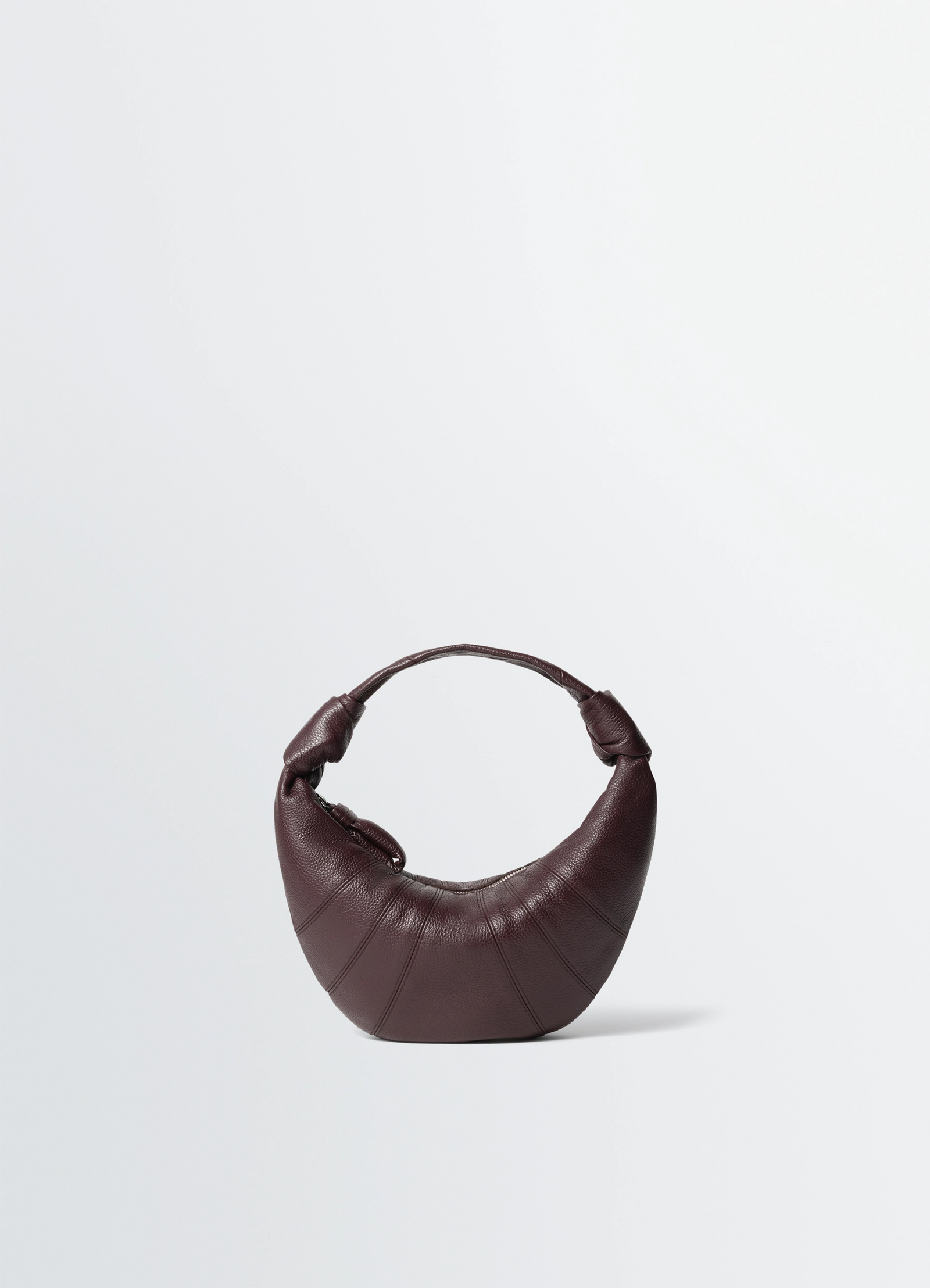 Mini fortune croissant bag in grained leather, product shot, front view half-moon shape