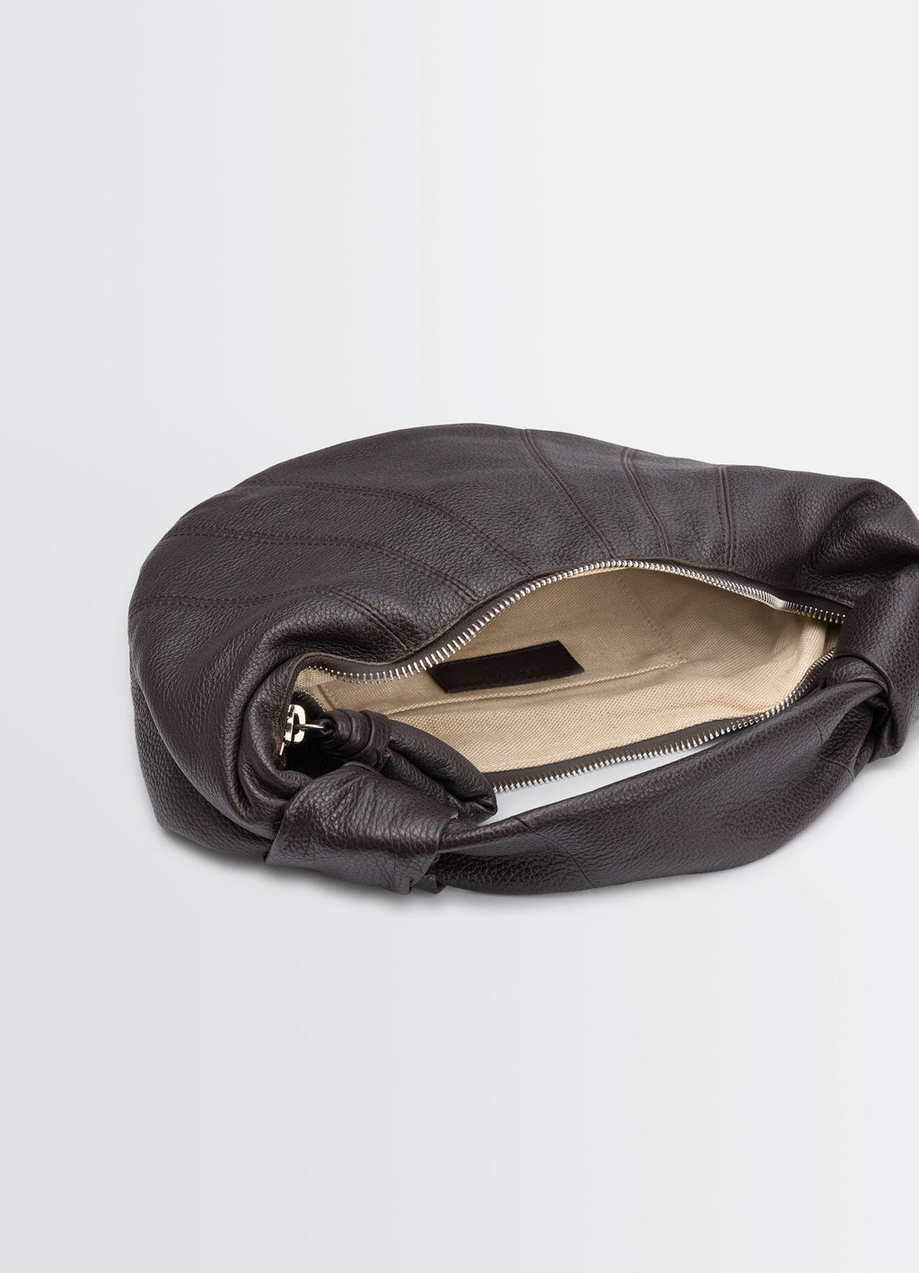 Mini Fortune Croissant Bag in Brown Leather, product shot, Top angle view Open zipper detail