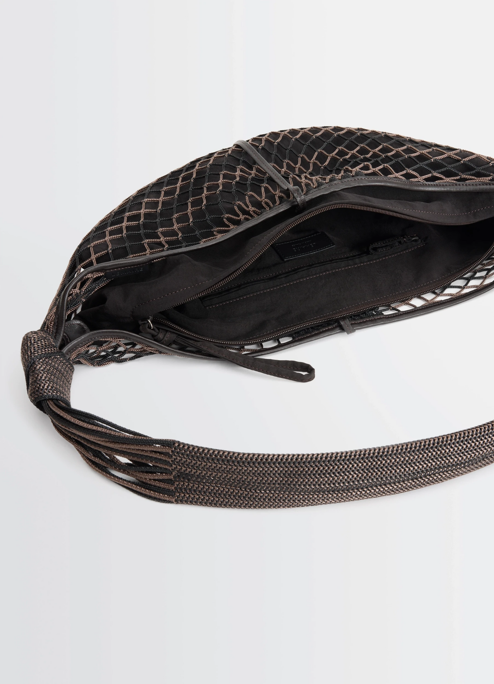 Lemaire croissant filt bag in black nylon net, product shot, interior detail shot zippered interior compartments