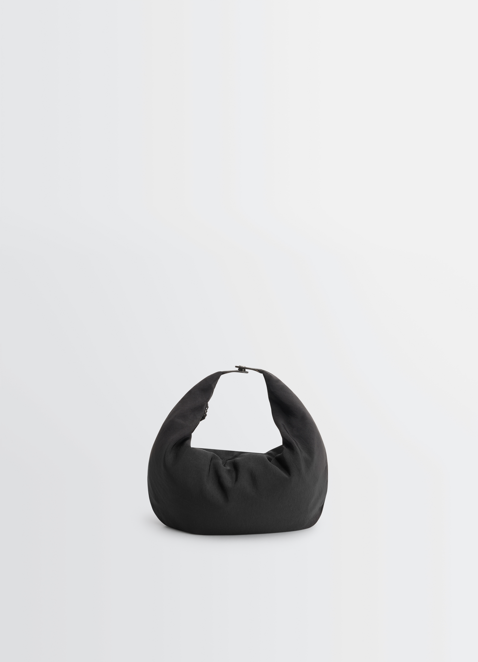 Lemaire croissant filt bag in black nylon net, product shot, top angled view curved hobo shape