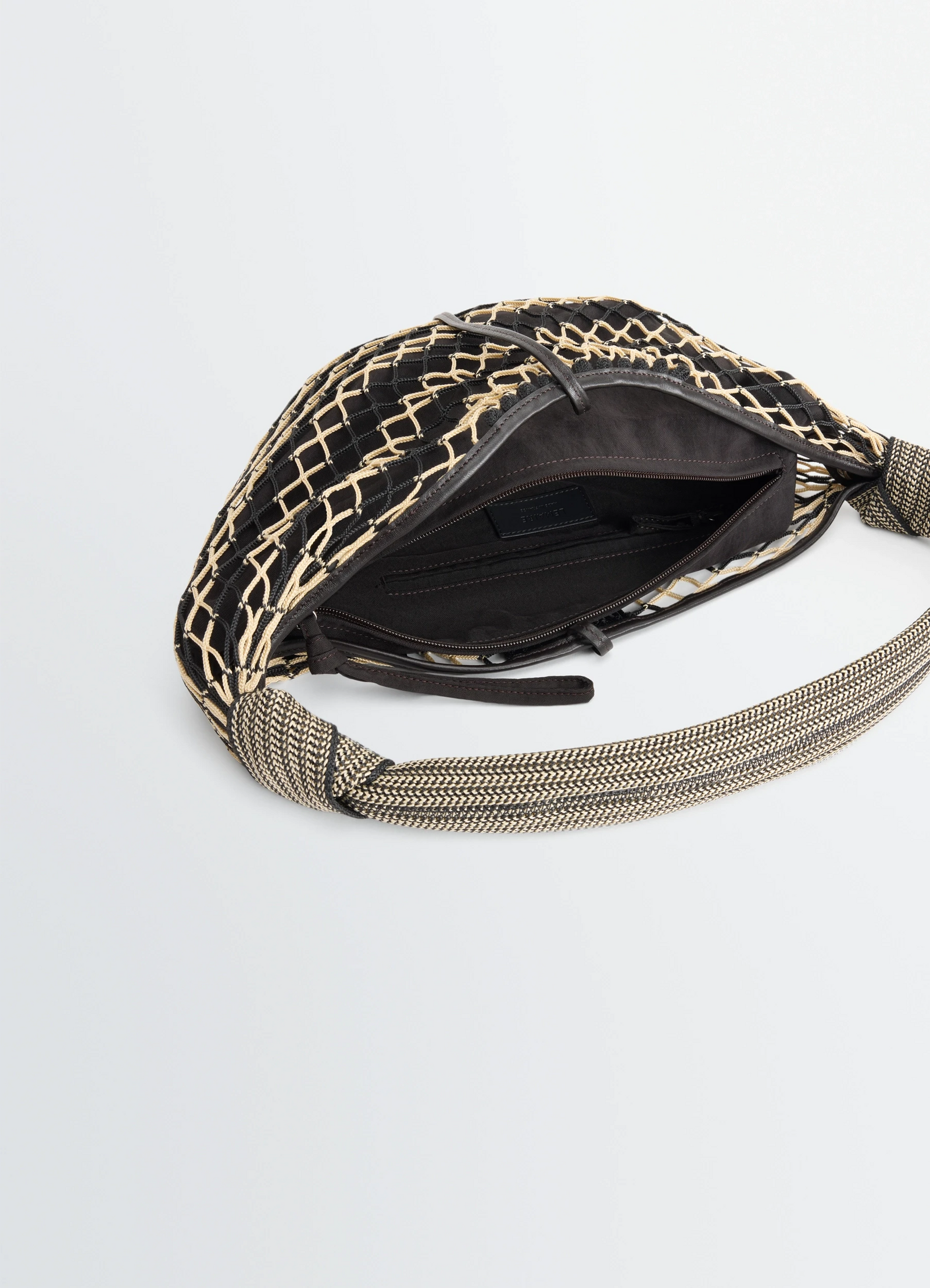 Fortune croissant filt bag in black nylon net, product shot, top interior view open top zigzag weave