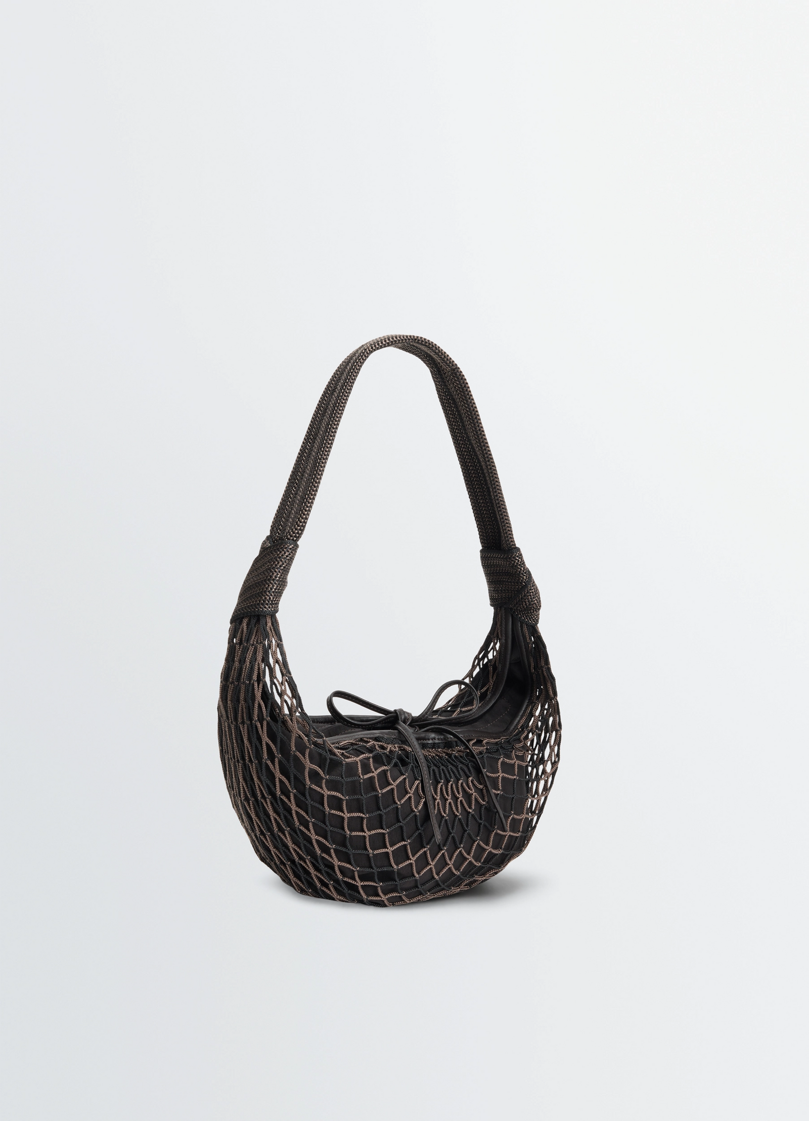 Fortune croissant filt bag in black nylon net, product shot, three-quarter view netted outer layer