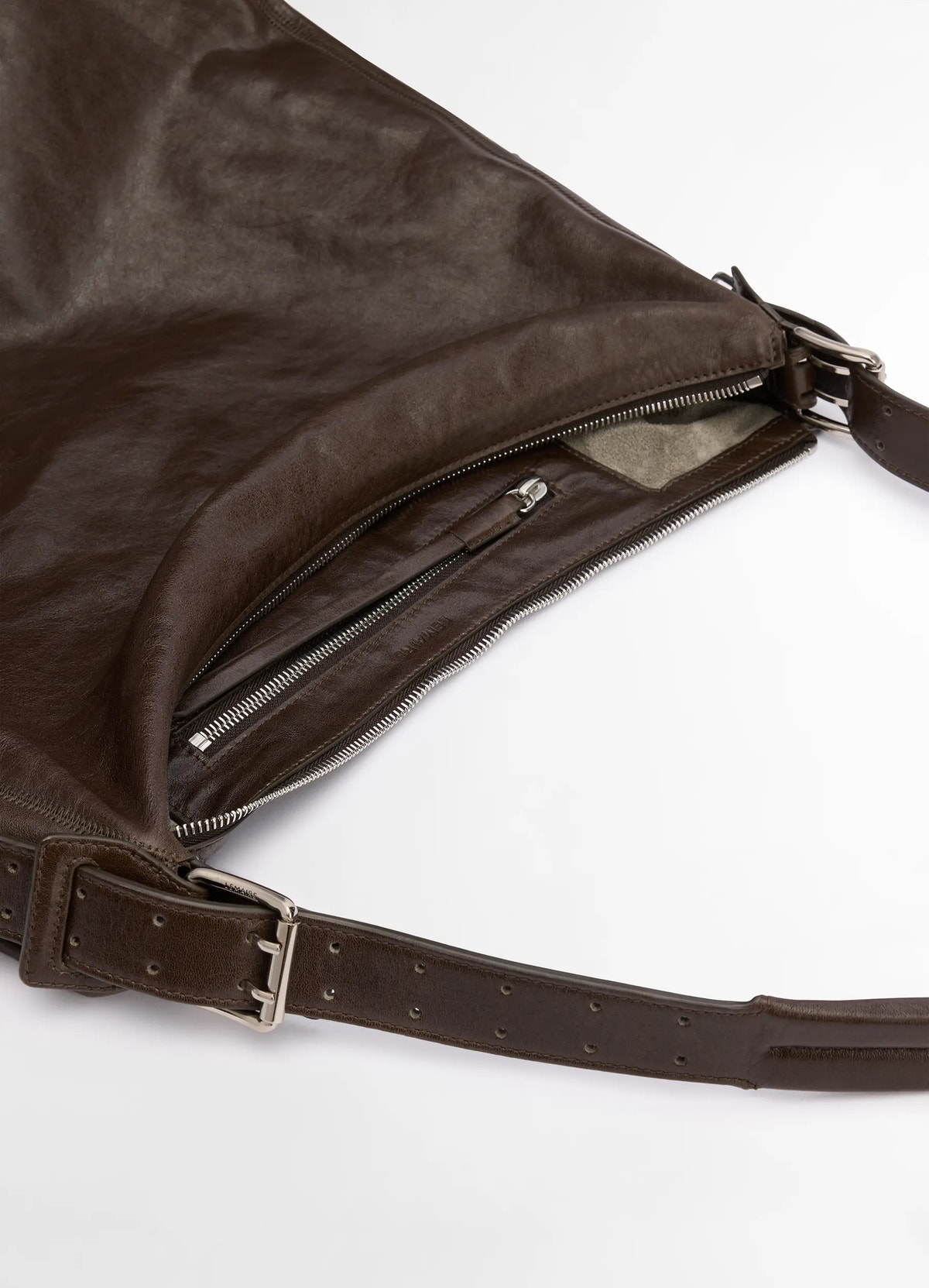 Lemaire belted hobo bag in thin shiny leather, product shot, zipper detail close-up interior zipper view