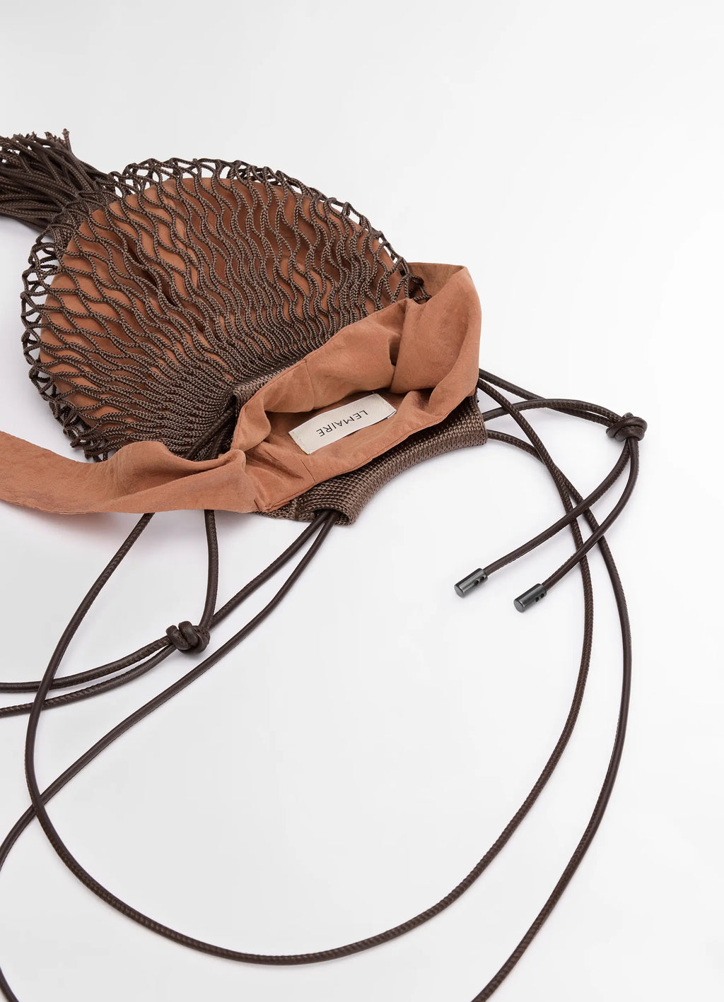 Octopus Croissant Filt Bag in Net with Leather Details, product shot, top angled detailed shot open top with drawstring