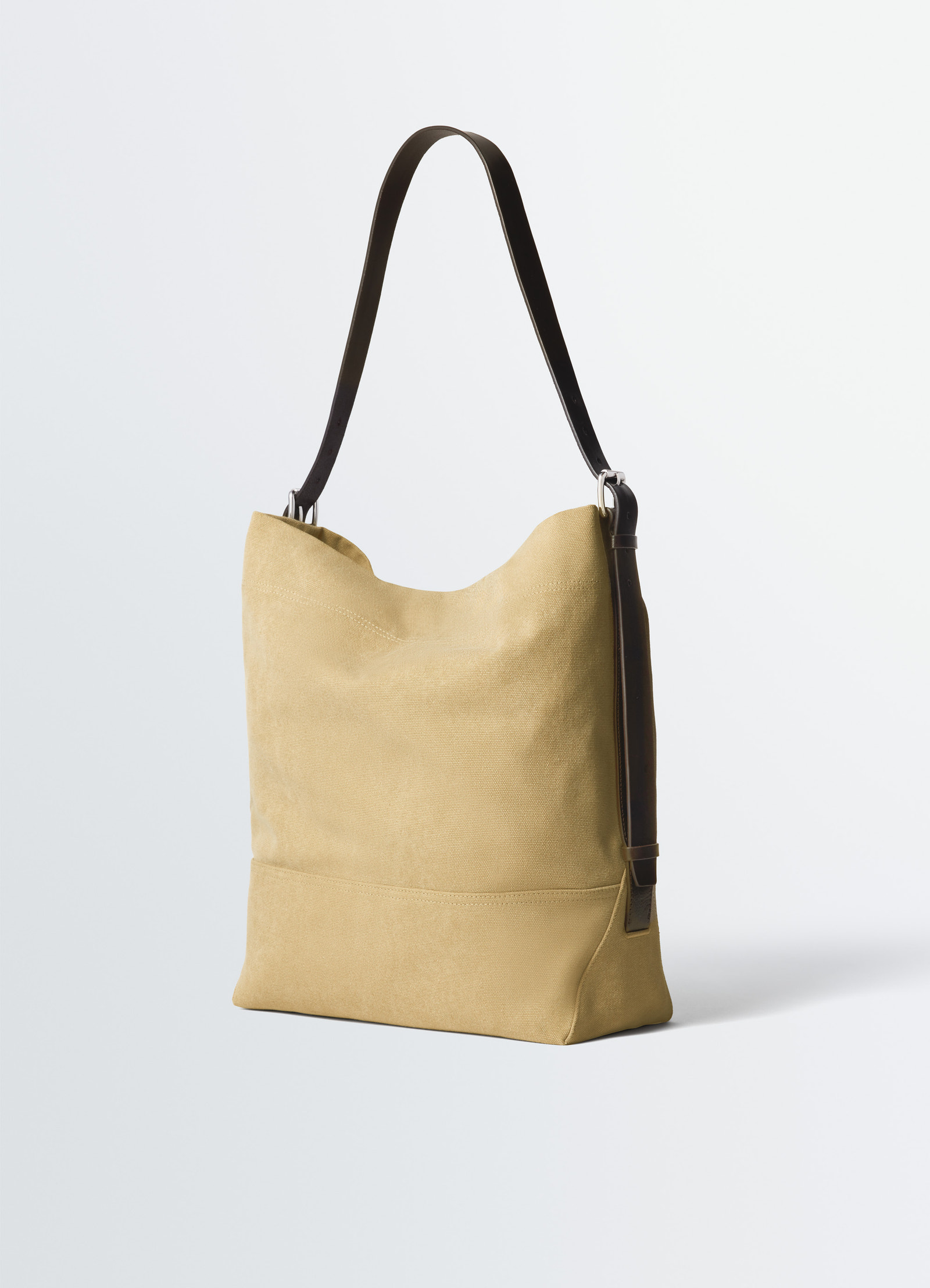 Belted tote bag in cotton canvas, product shot, side view contrasting dark strap