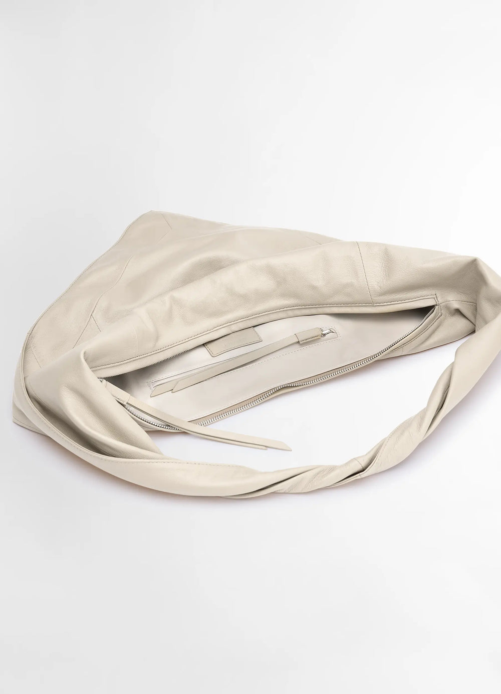 Lemaire Scarf Bag Small in Smooth Nappa Leather, product shot, top angle view open interior zipper detail