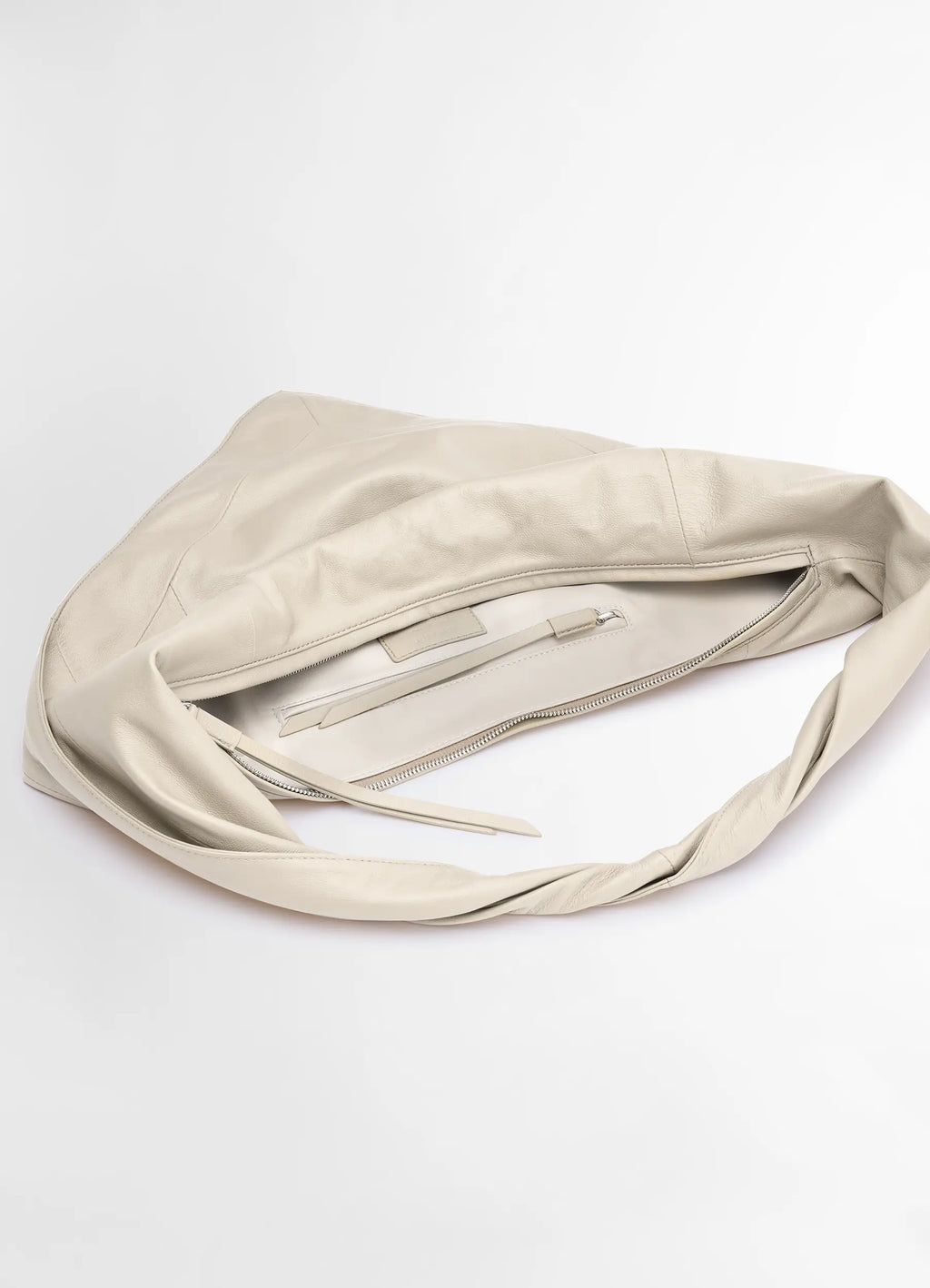 Lemaire Scarf Bag Small in Smooth Nappa Leather, product shot, top angle view open interior zipper detail