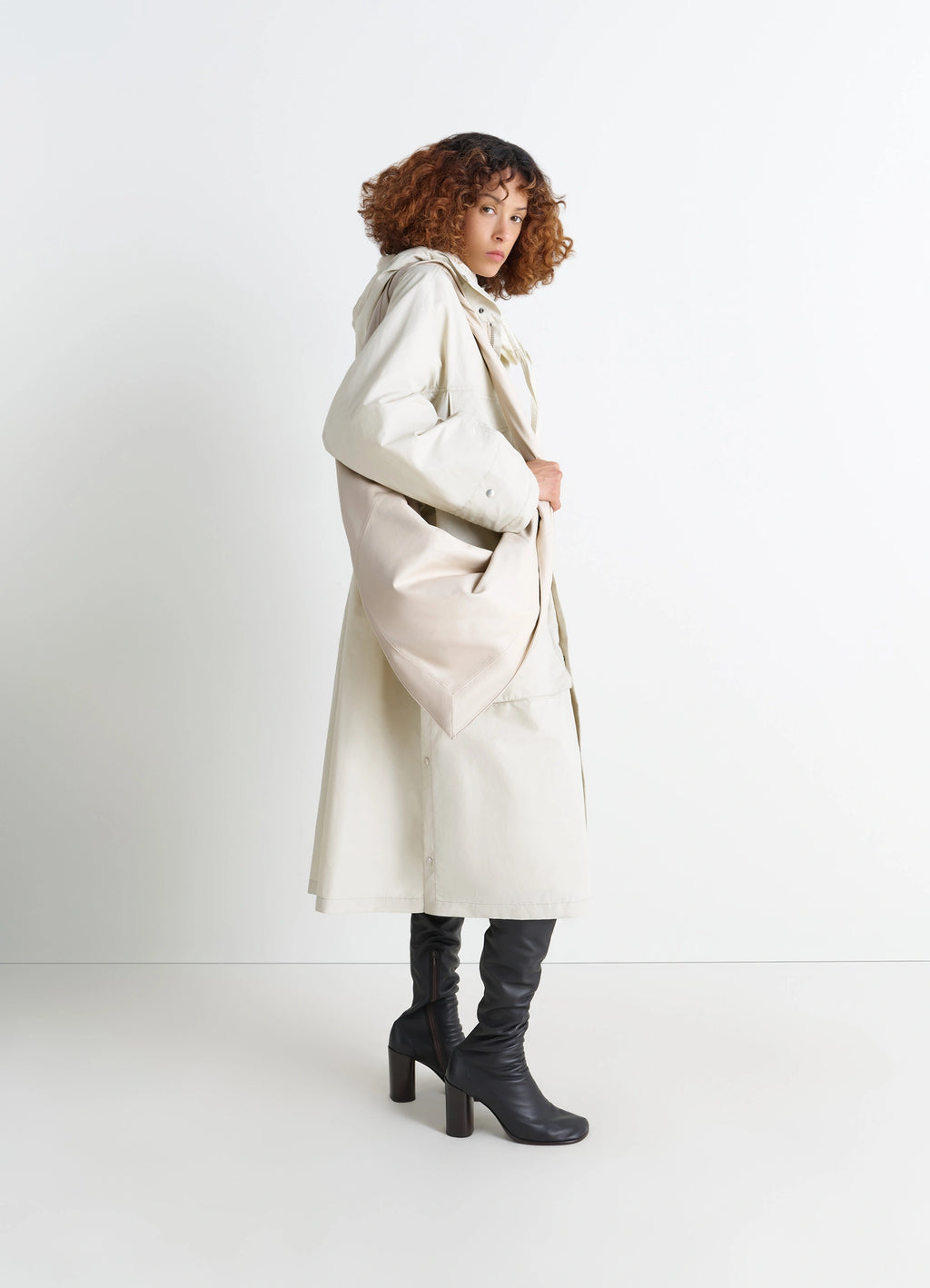 Lemaire Scarf Bag in Nappa Leather, model shot, angled from behind view gathered soft texture