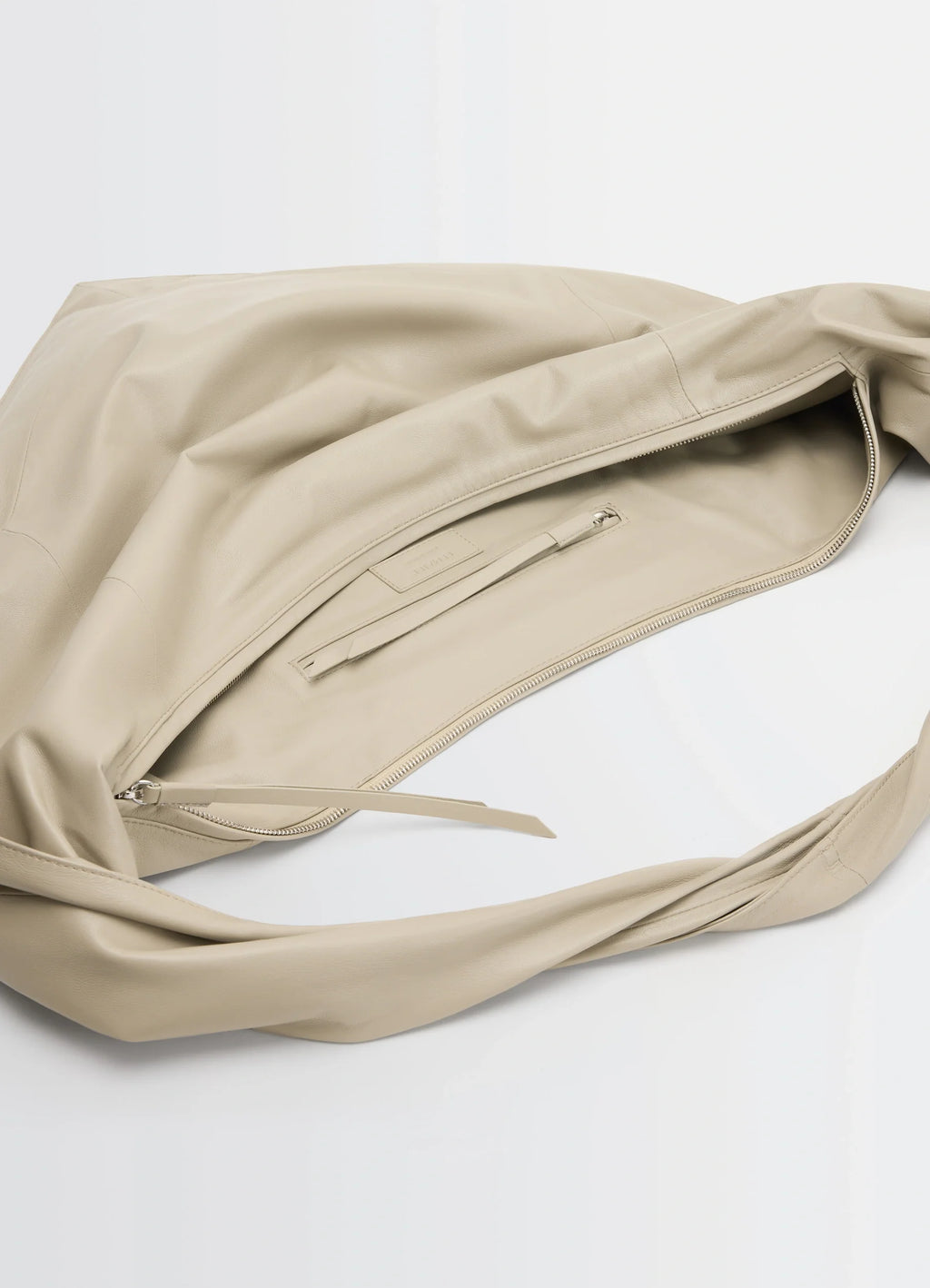 Lemaire Scarf Bag in Nappa Leather, product shot, top interior view zippered pocket detail