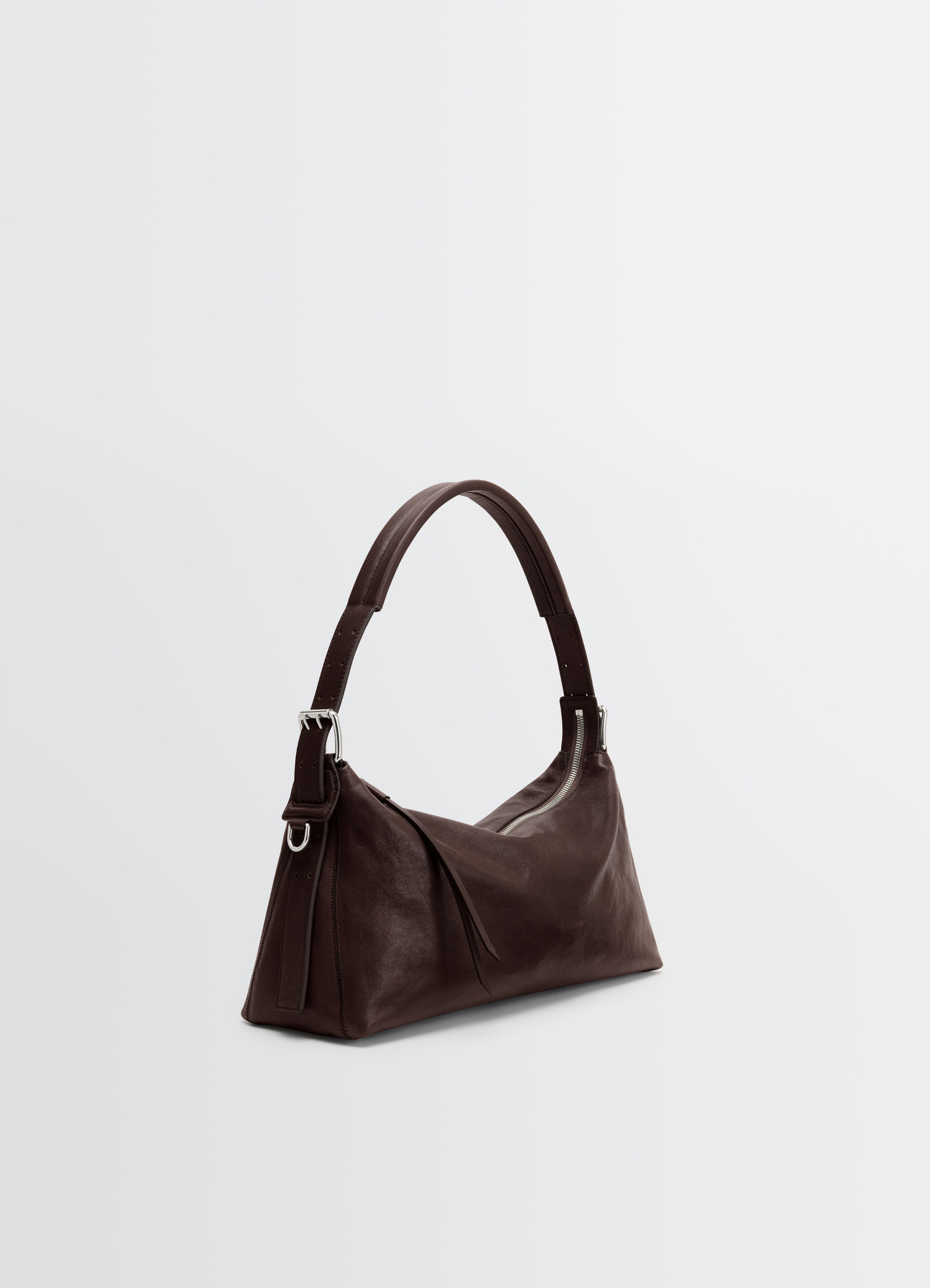Belted baguette bag in brown paper lux leather, product shot, angled top view smooth leather texture