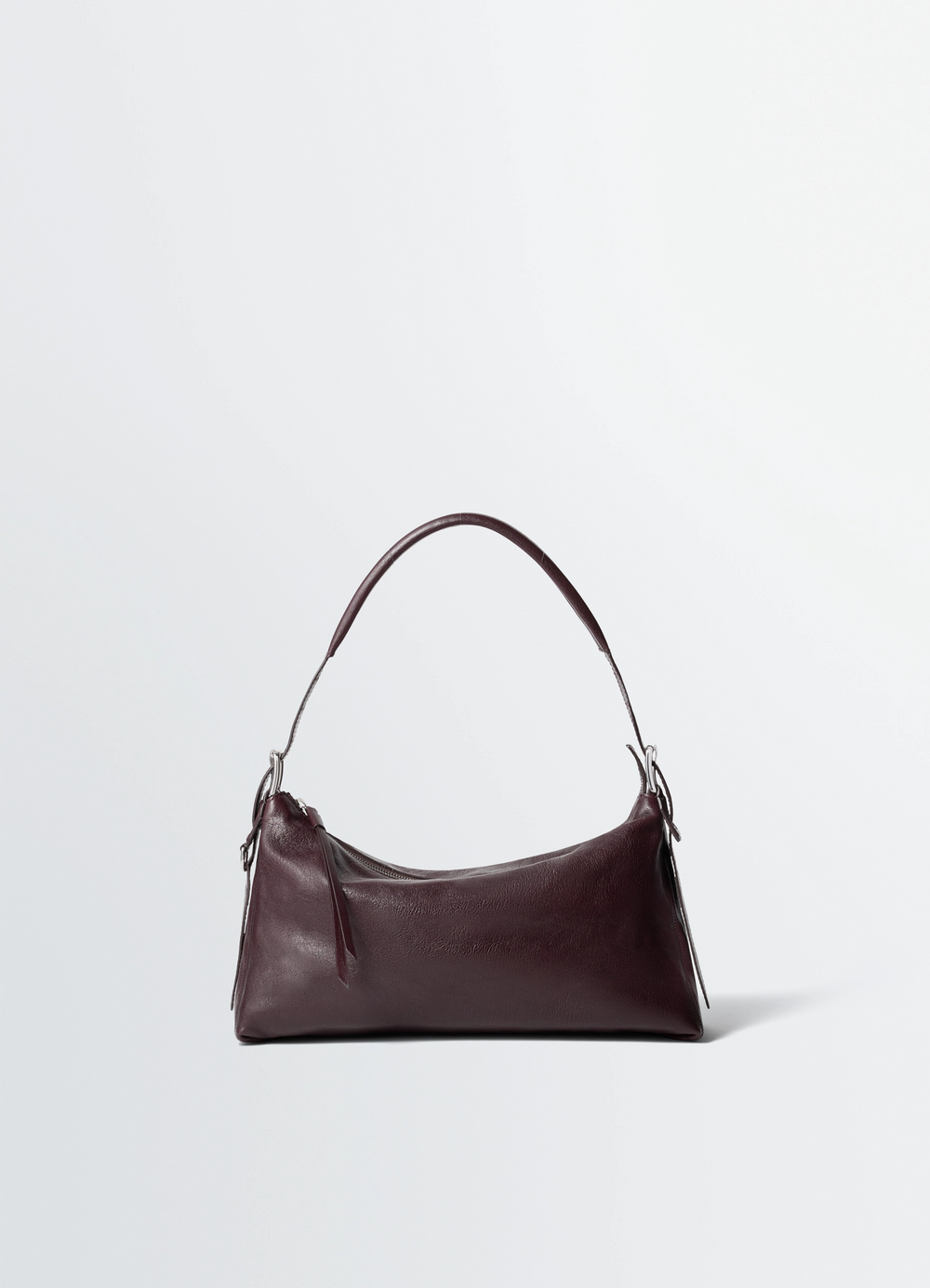 BELTED BAGUETTE BAG IN LEATHER