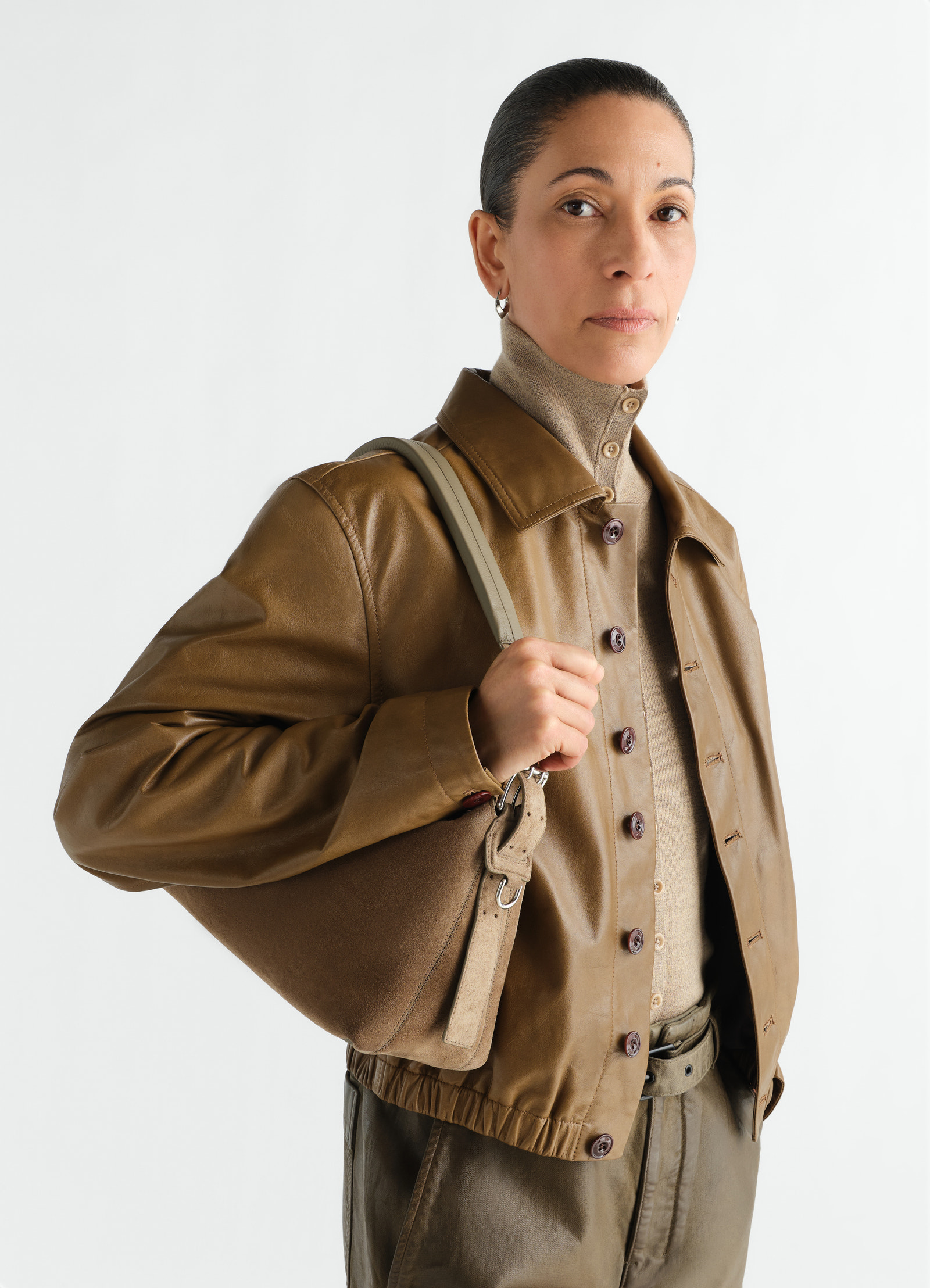 Belted baguette bag in suede leather